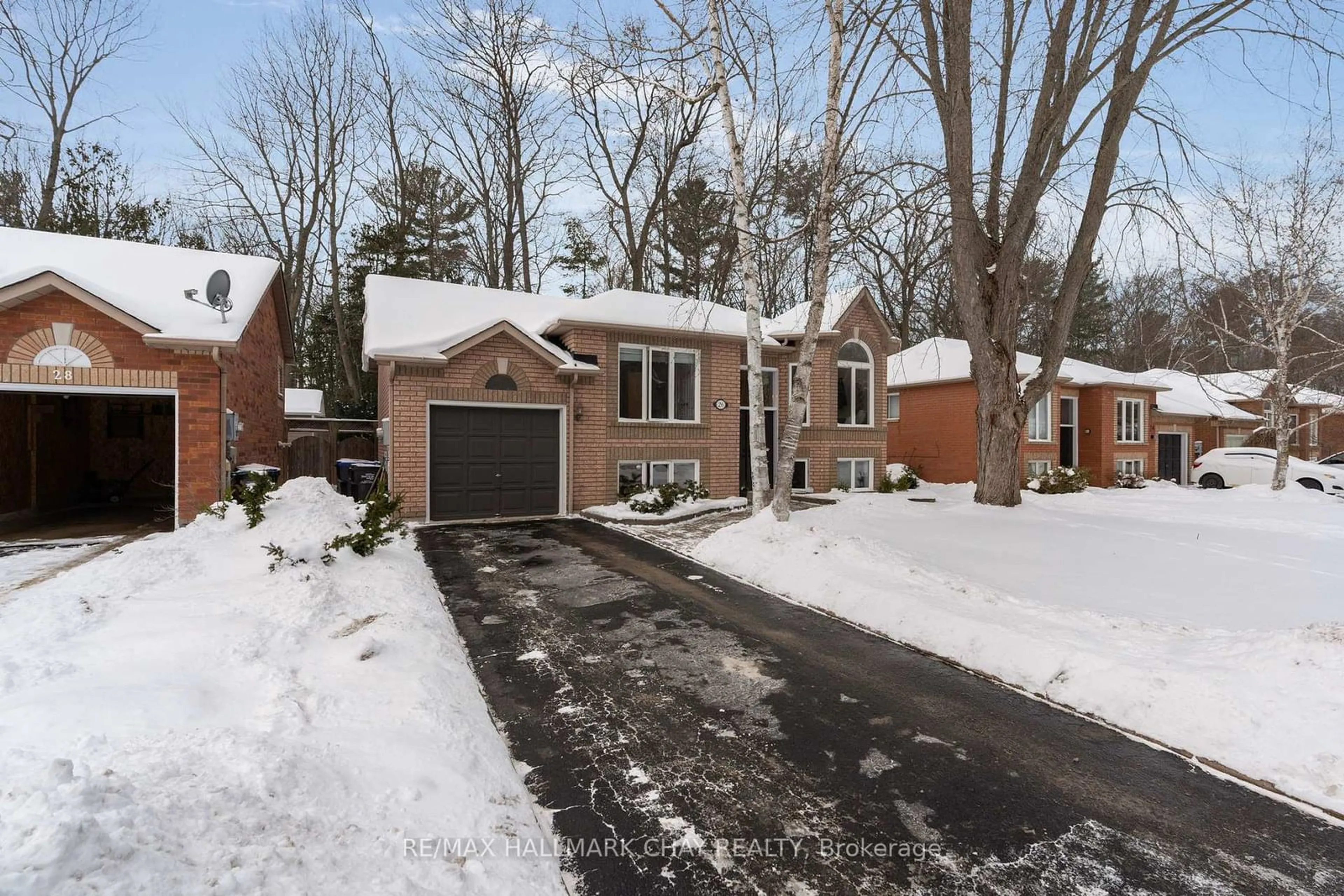 Home with brick exterior material, street for 26 Brillinger Dr, Wasaga Beach Ontario L9Z 1L4