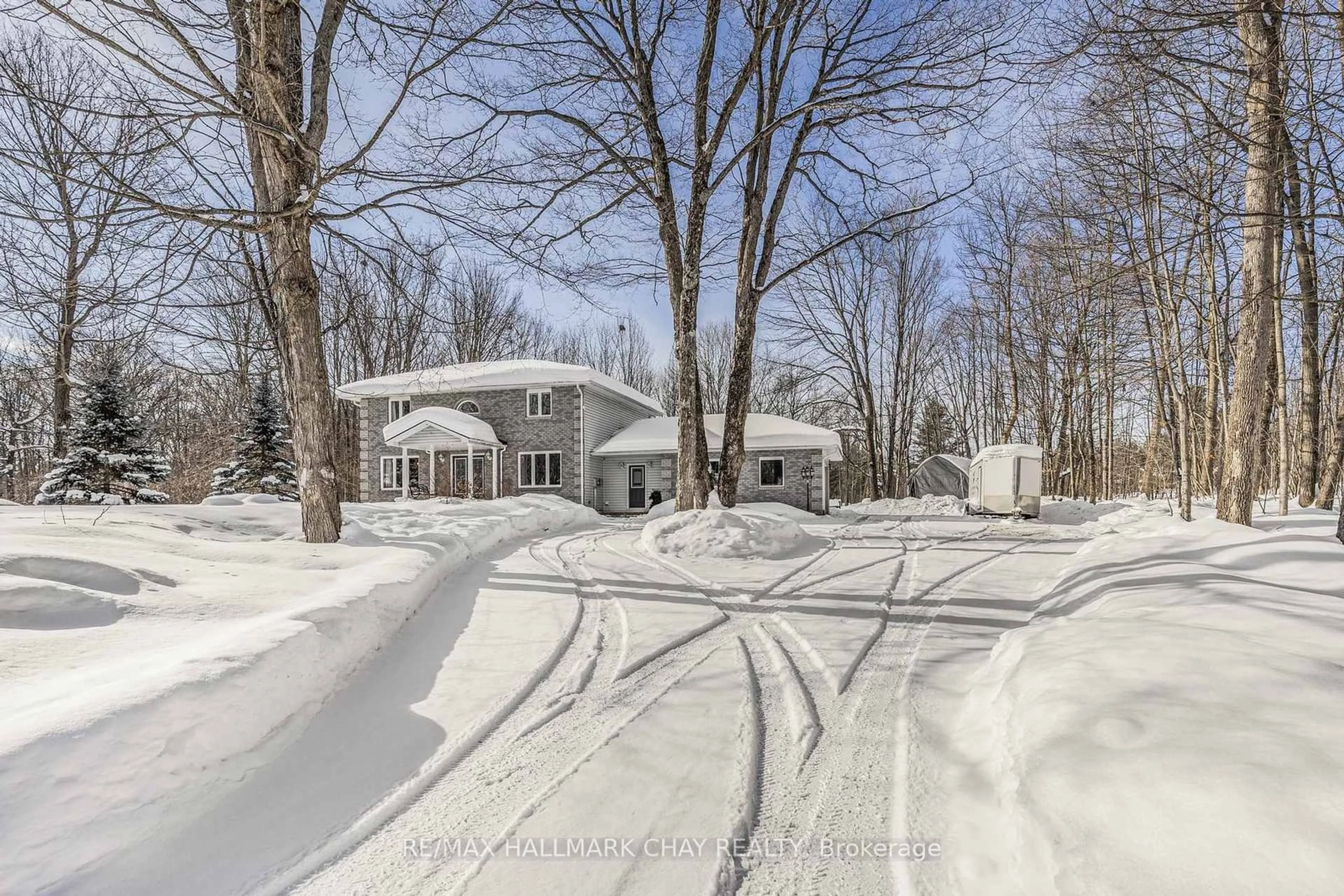 A pic from outside/outdoor area/front of a property/back of a property/a pic from drone, street for 5810 Lowanda Lane, Ramara Ontario L0K 1W0