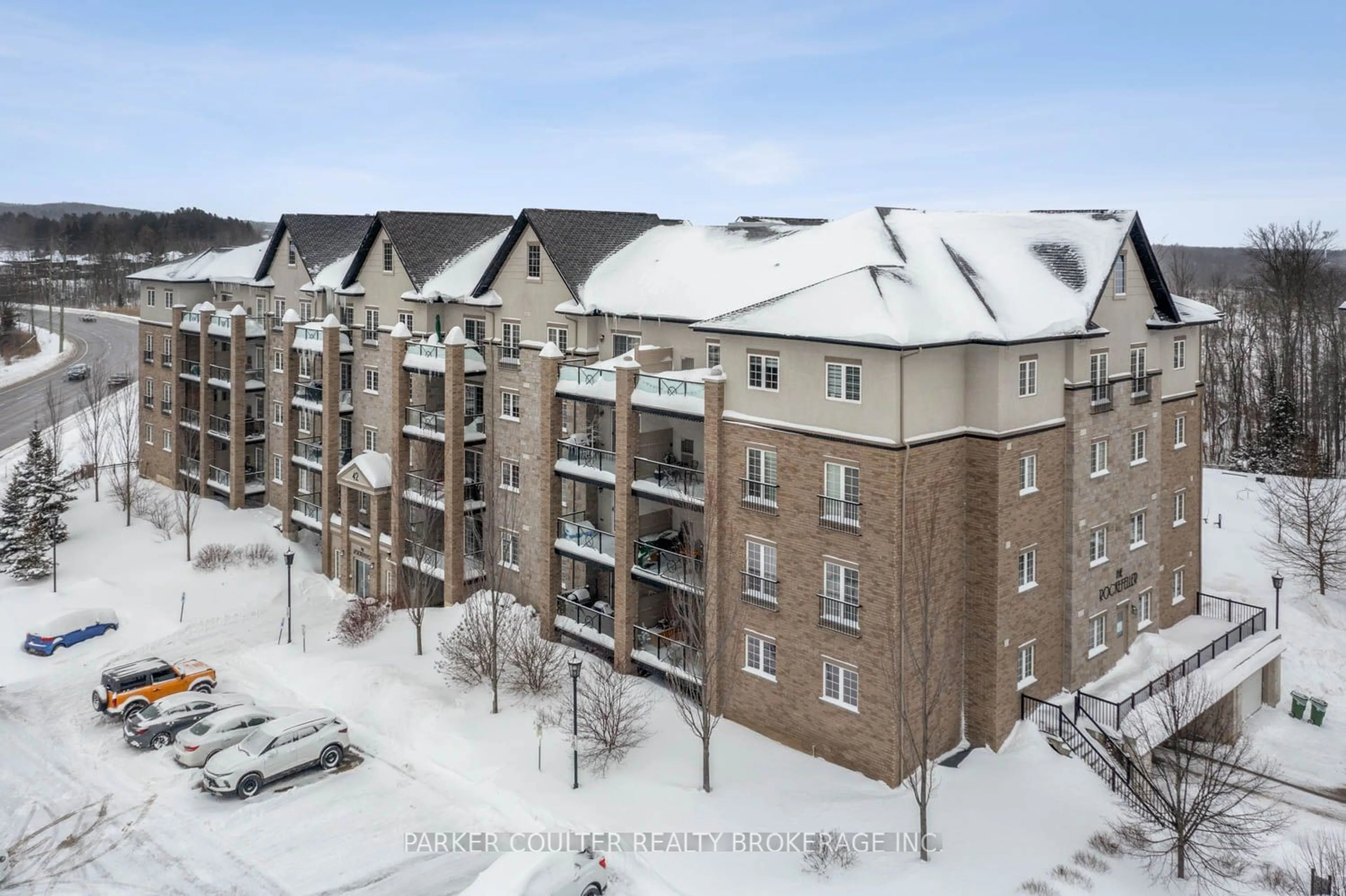 A pic from outside/outdoor area/front of a property/back of a property/a pic from drone, building for 42 Ferndale Dr #409, Barrie Ontario L4N 2M5