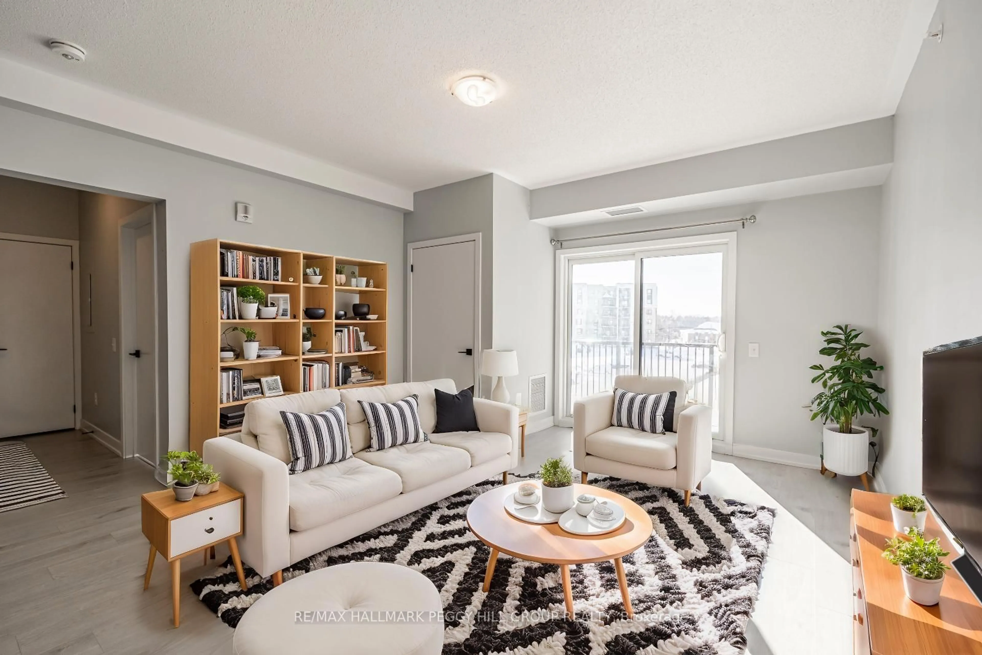 Living room with furniture, unknown for 4 Spice Way #215, Barrie Ontario L9J 0M2