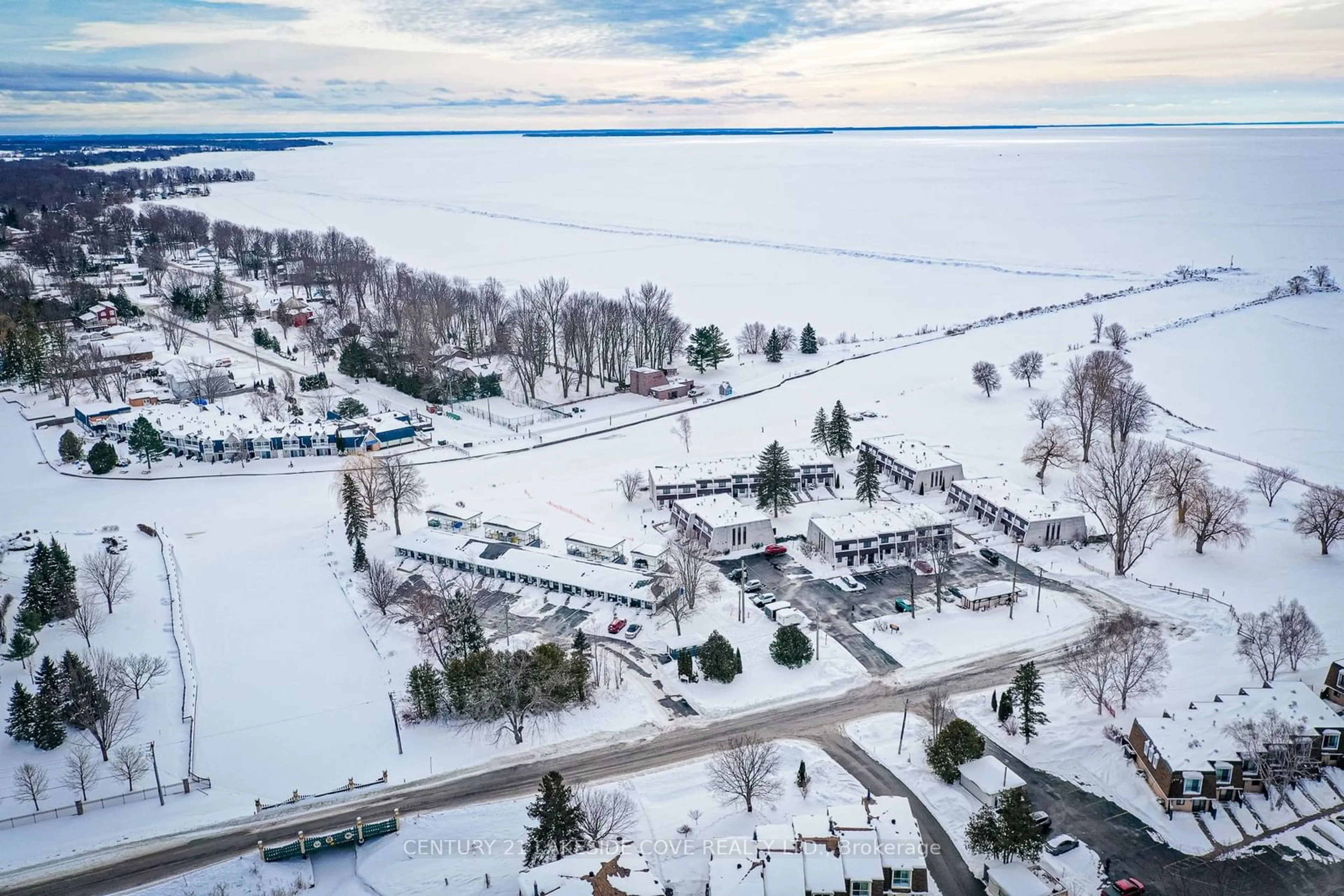 A pic from outside/outdoor area/front of a property/back of a property/a pic from drone, water/lake/river/ocean view for 4 Paradise Blvd #19, Ramara Ontario L0K 1B0