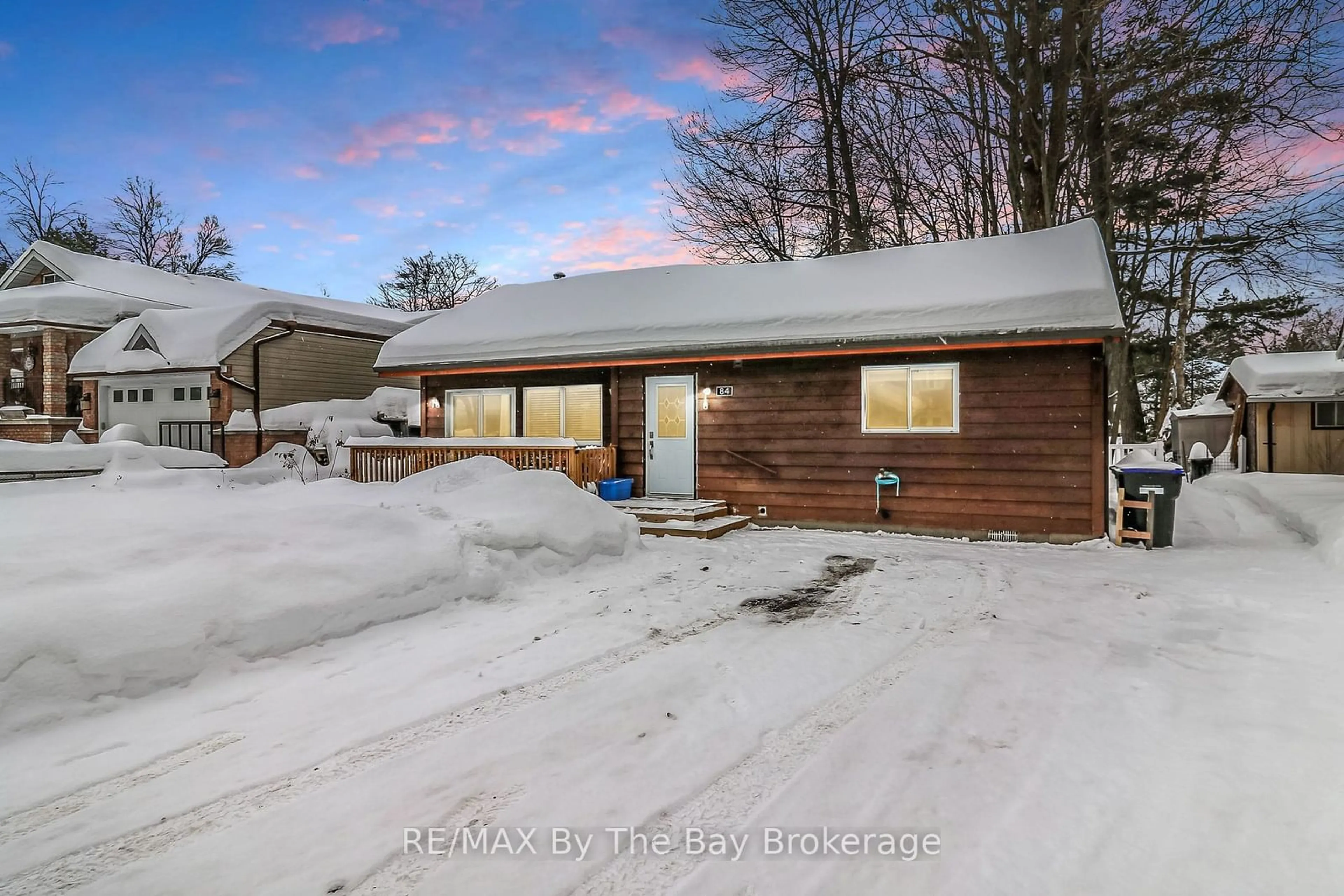 A pic from outside/outdoor area/front of a property/back of a property/a pic from drone, unknown for 84 32nd St, Wasaga Beach Ontario L9Z 2C4