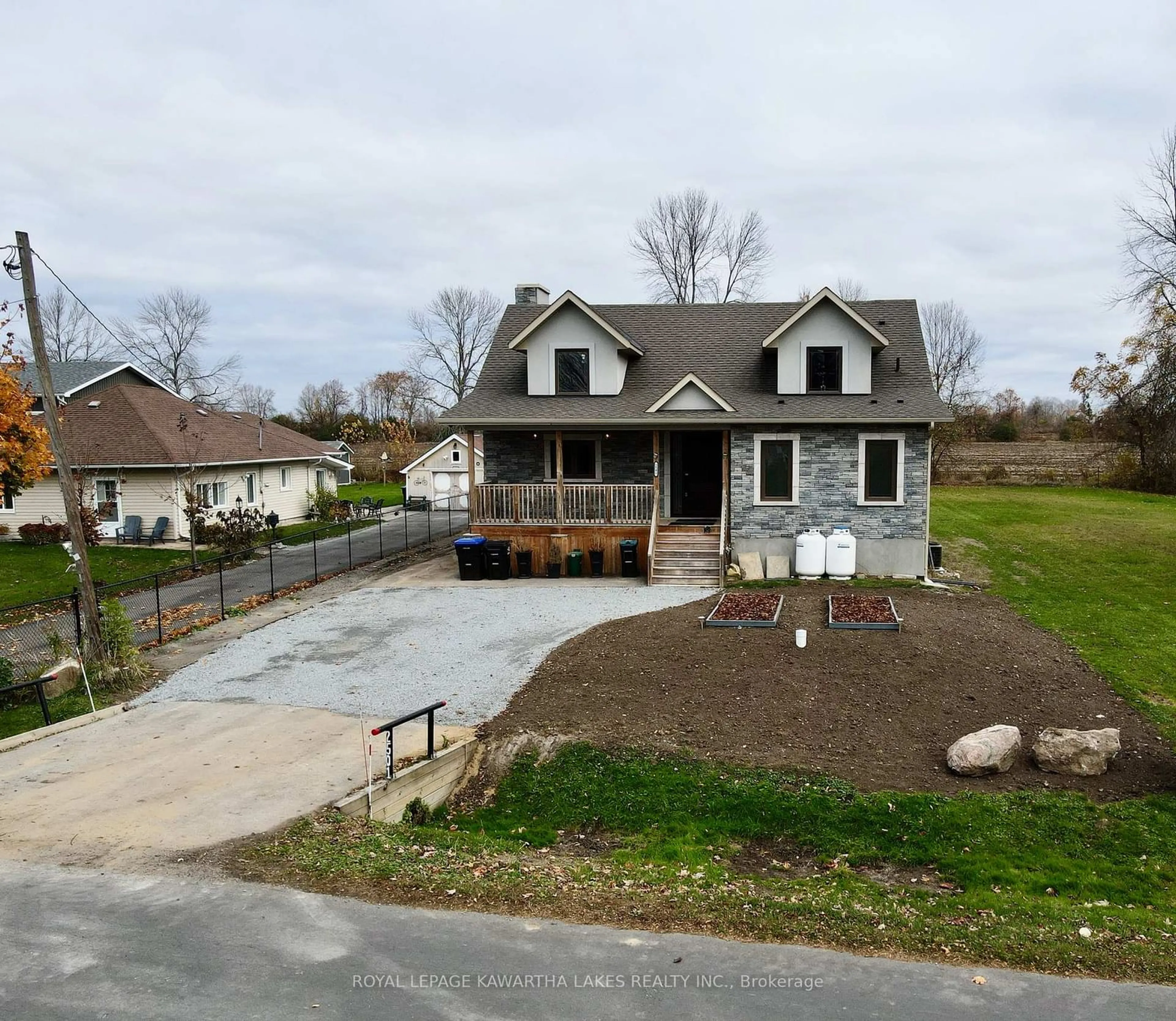 A pic from outside/outdoor area/front of a property/back of a property/a pic from drone, street for 2501 Lakeshore Dr, Ramara Ontario L0K 1B0