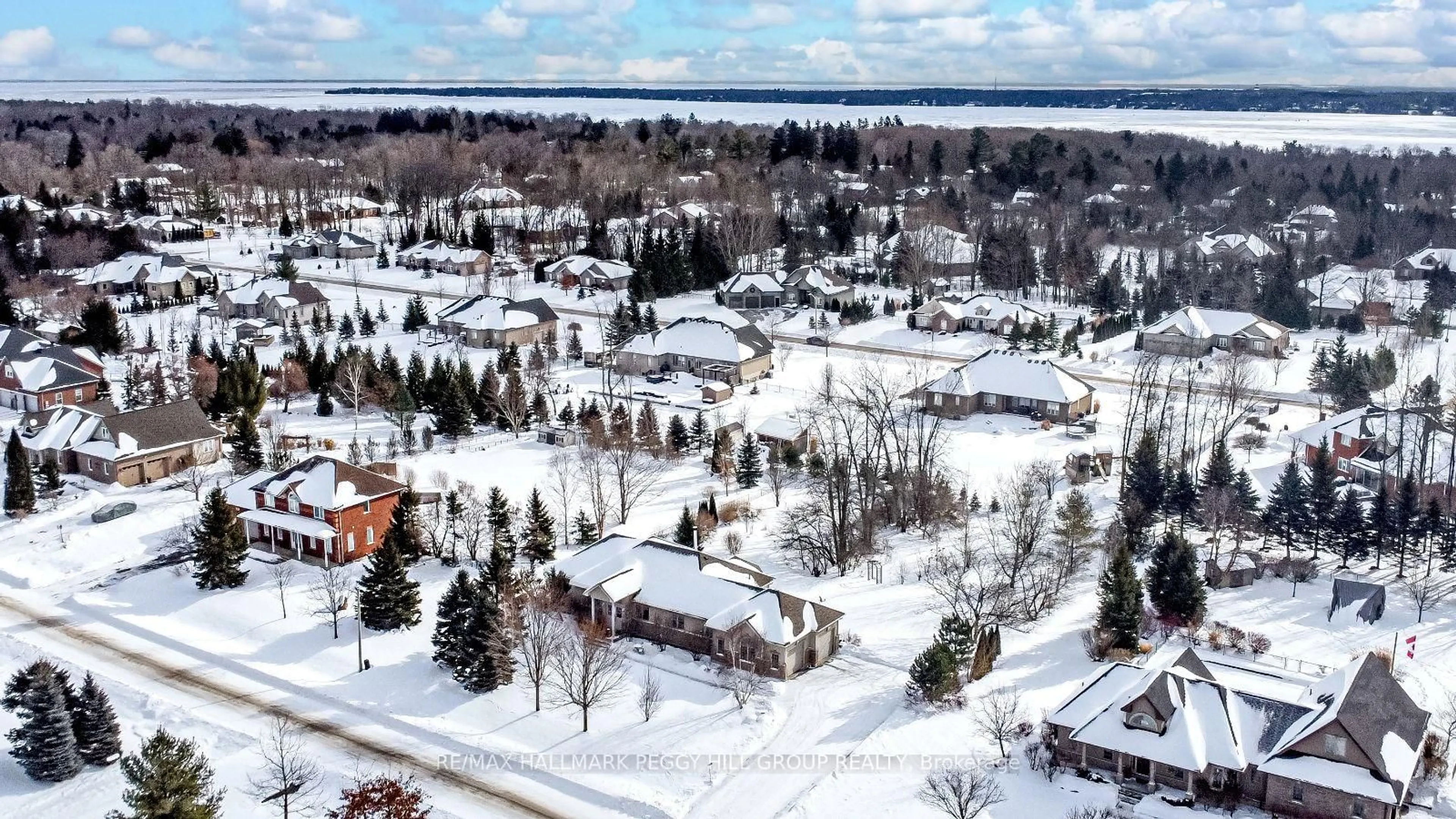 A pic from outside/outdoor area/front of a property/back of a property/a pic from drone, street for 32 Basswood Circ, Oro-Medonte Ontario L0L 2L0