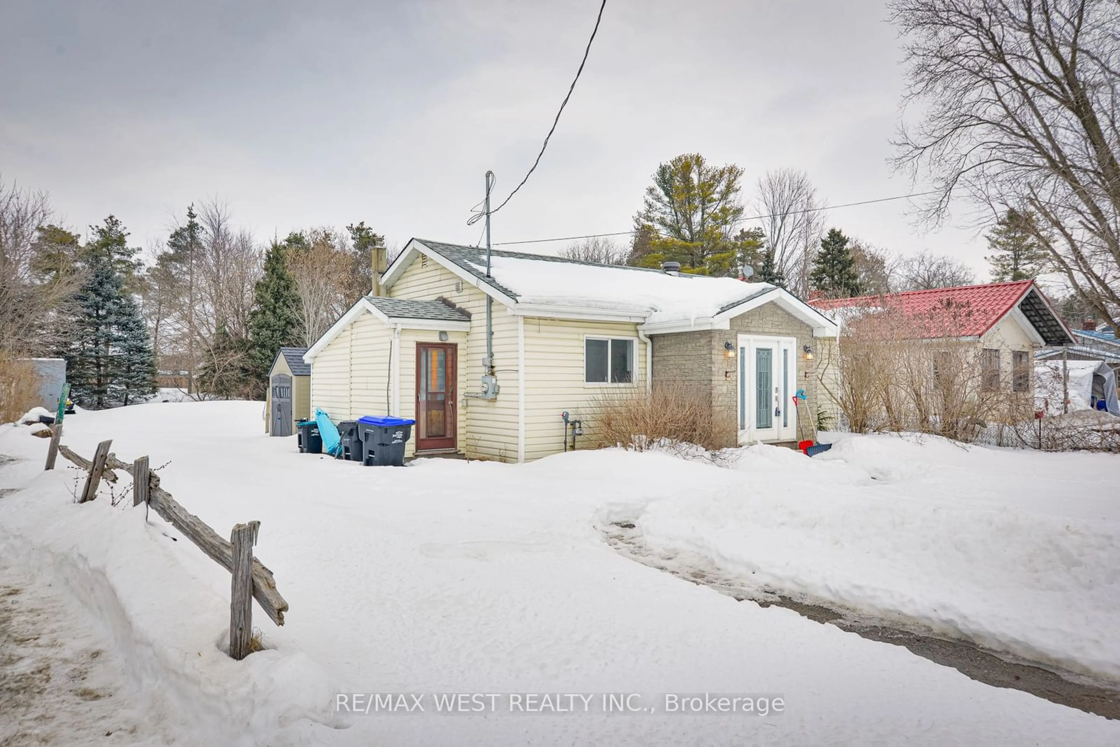 A pic from outside/outdoor area/front of a property/back of a property/a pic from drone, street for 5516 County Road 90, Springwater Ontario L0M 1T2