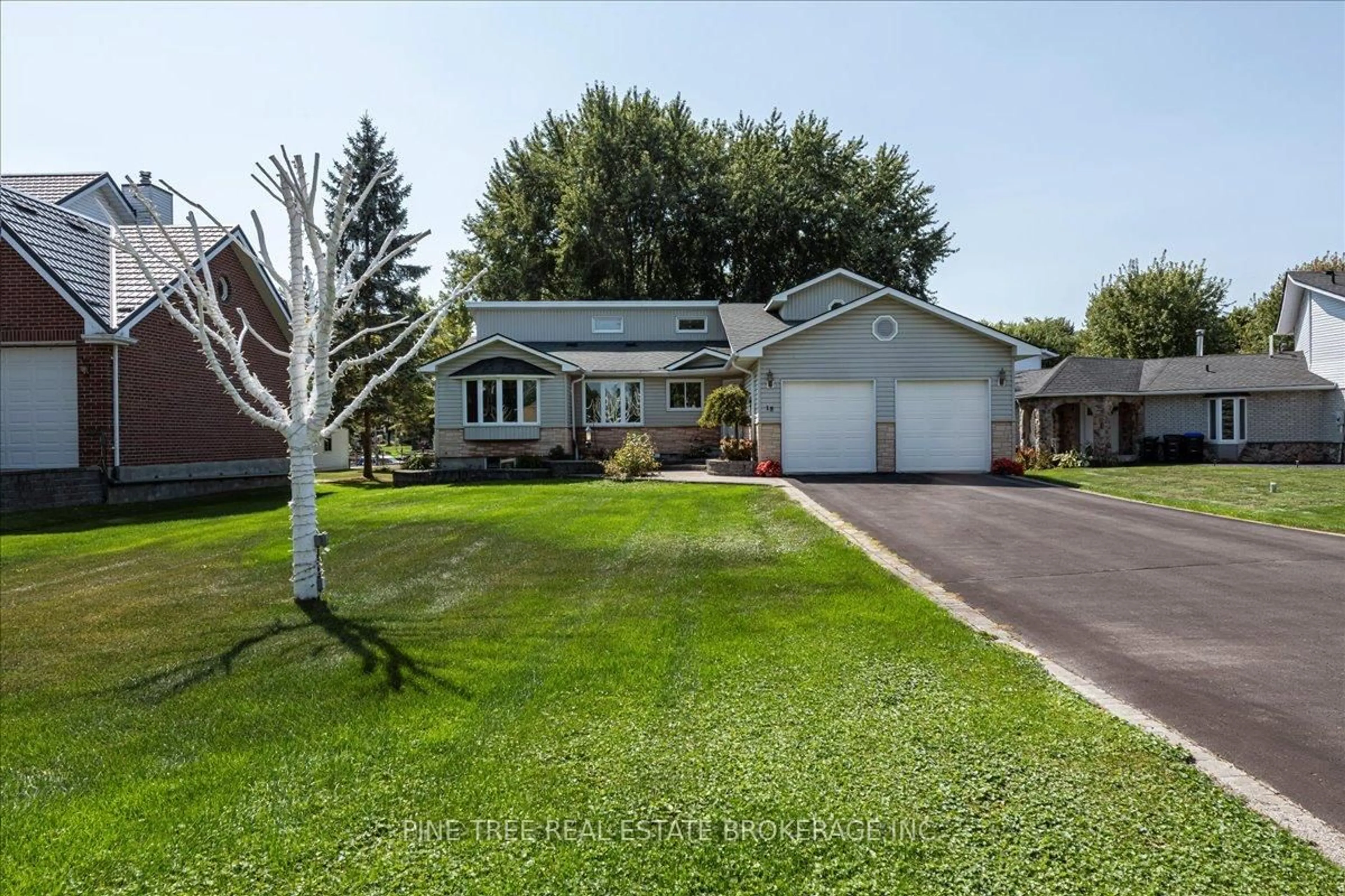 A pic from outside/outdoor area/front of a property/back of a property/a pic from drone, street for 18 Turtle Path, Ramara Ontario L0K 1B0