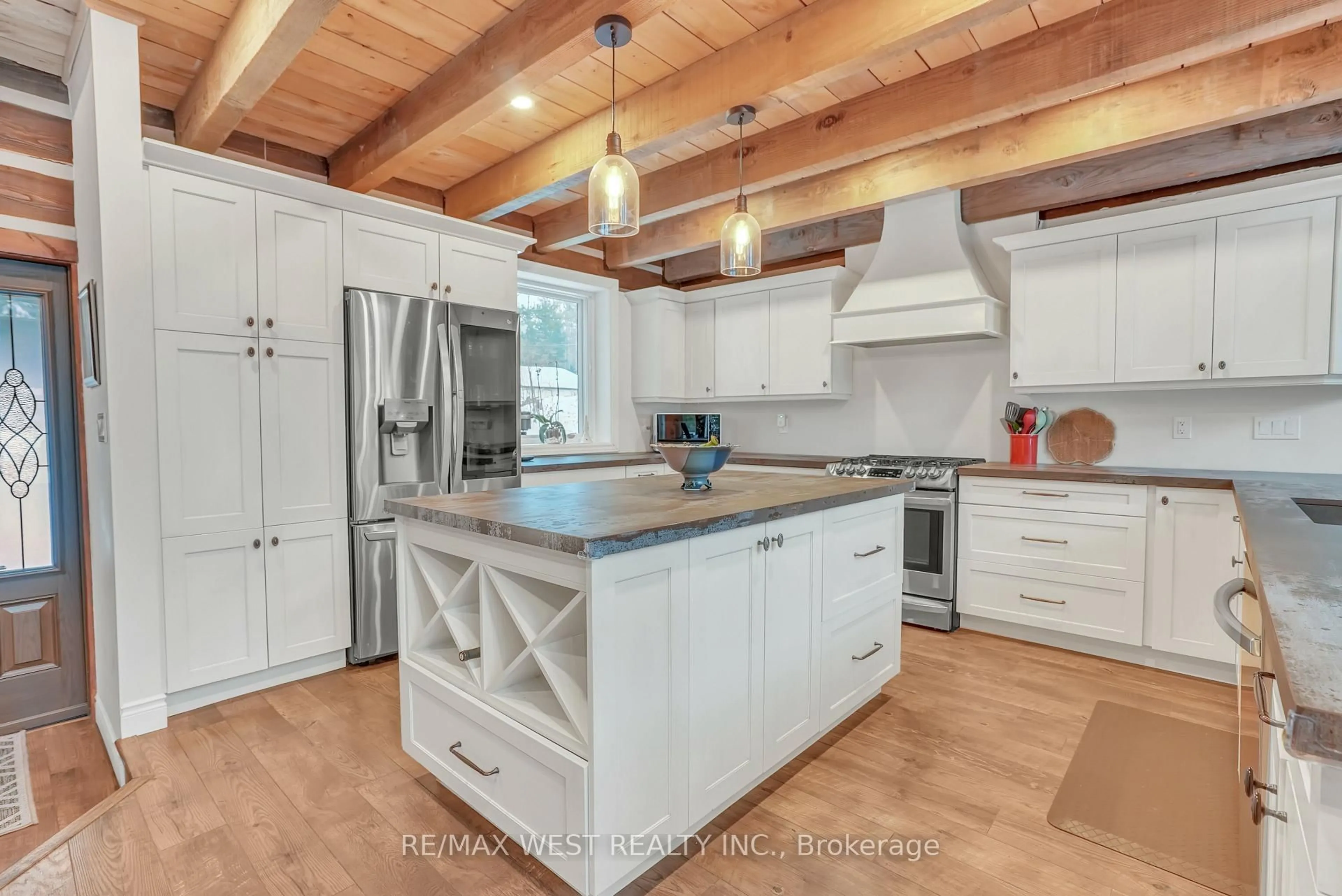 Open concept kitchen, unknown for 2987 Marshall Rd, Springwater Ontario L0L 1P0