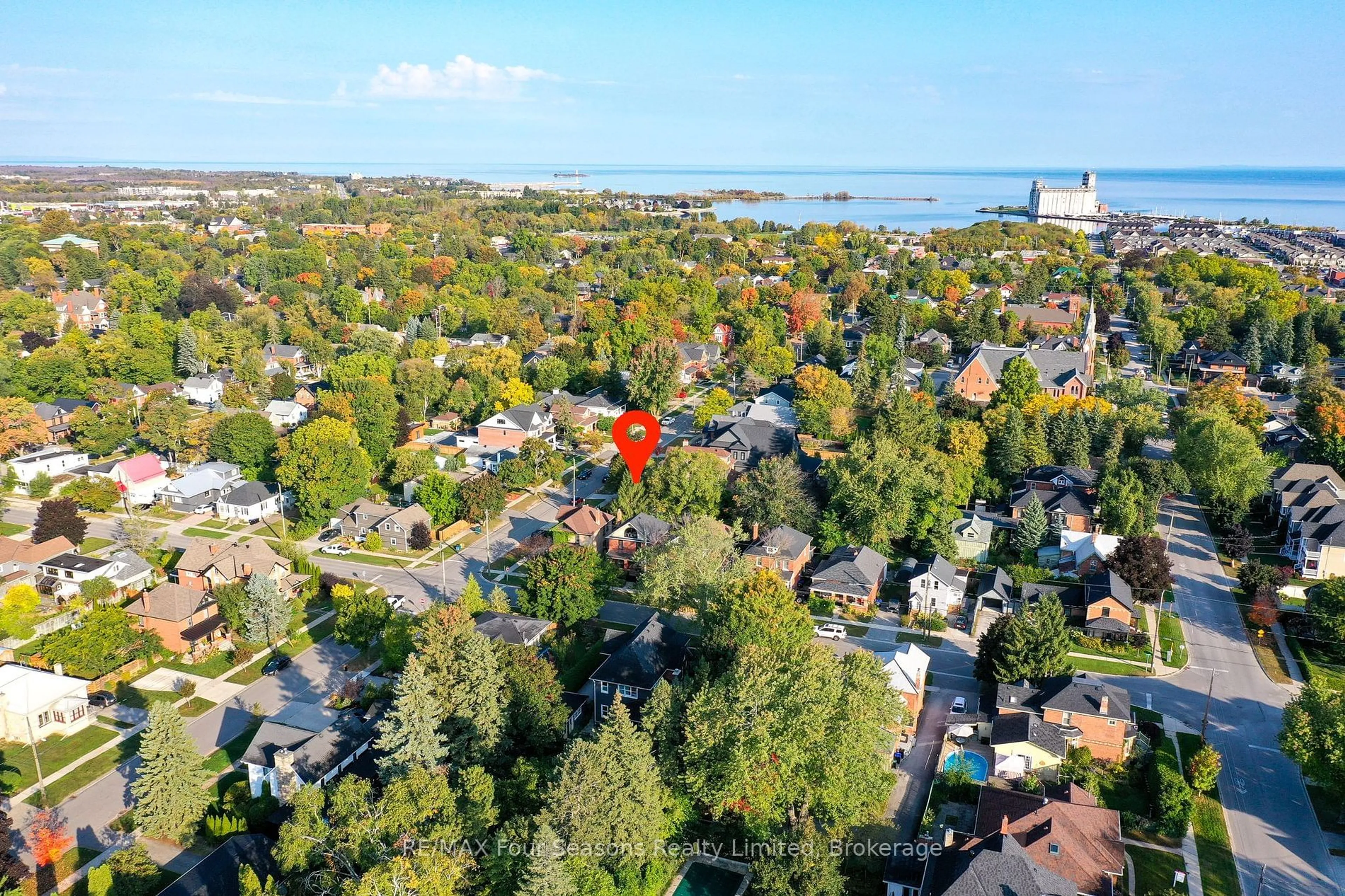 A pic from outside/outdoor area/front of a property/back of a property/a pic from drone, water/lake/river/ocean view for 143 Fourth St, Collingwood Ontario L9Y 1R6