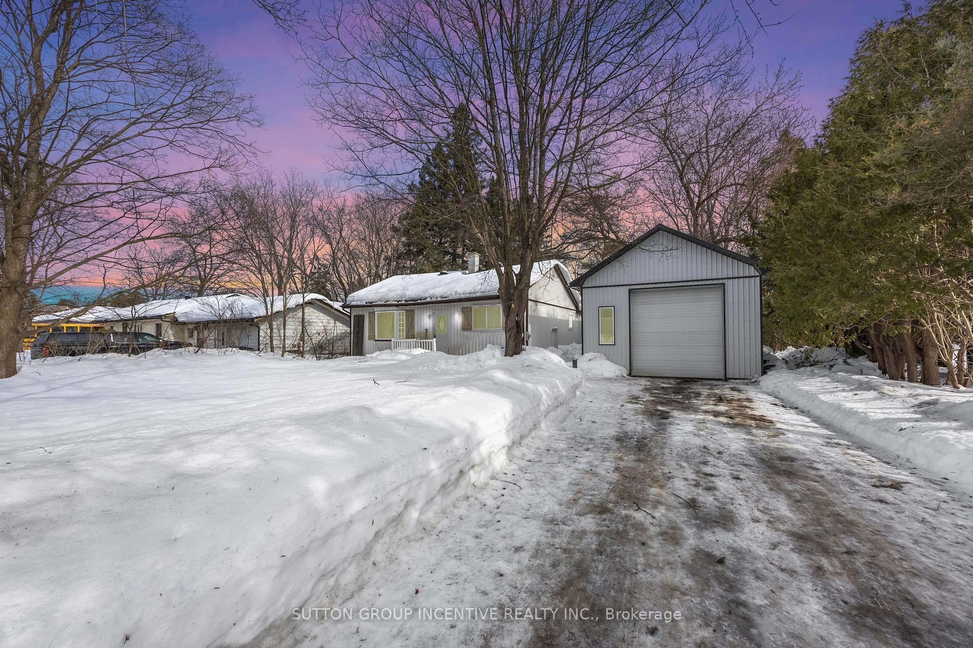 A pic from outside/outdoor area/front of a property/back of a property/a pic from drone, street for 1213 Bayfield St, Springwater Ontario L9X 0N6