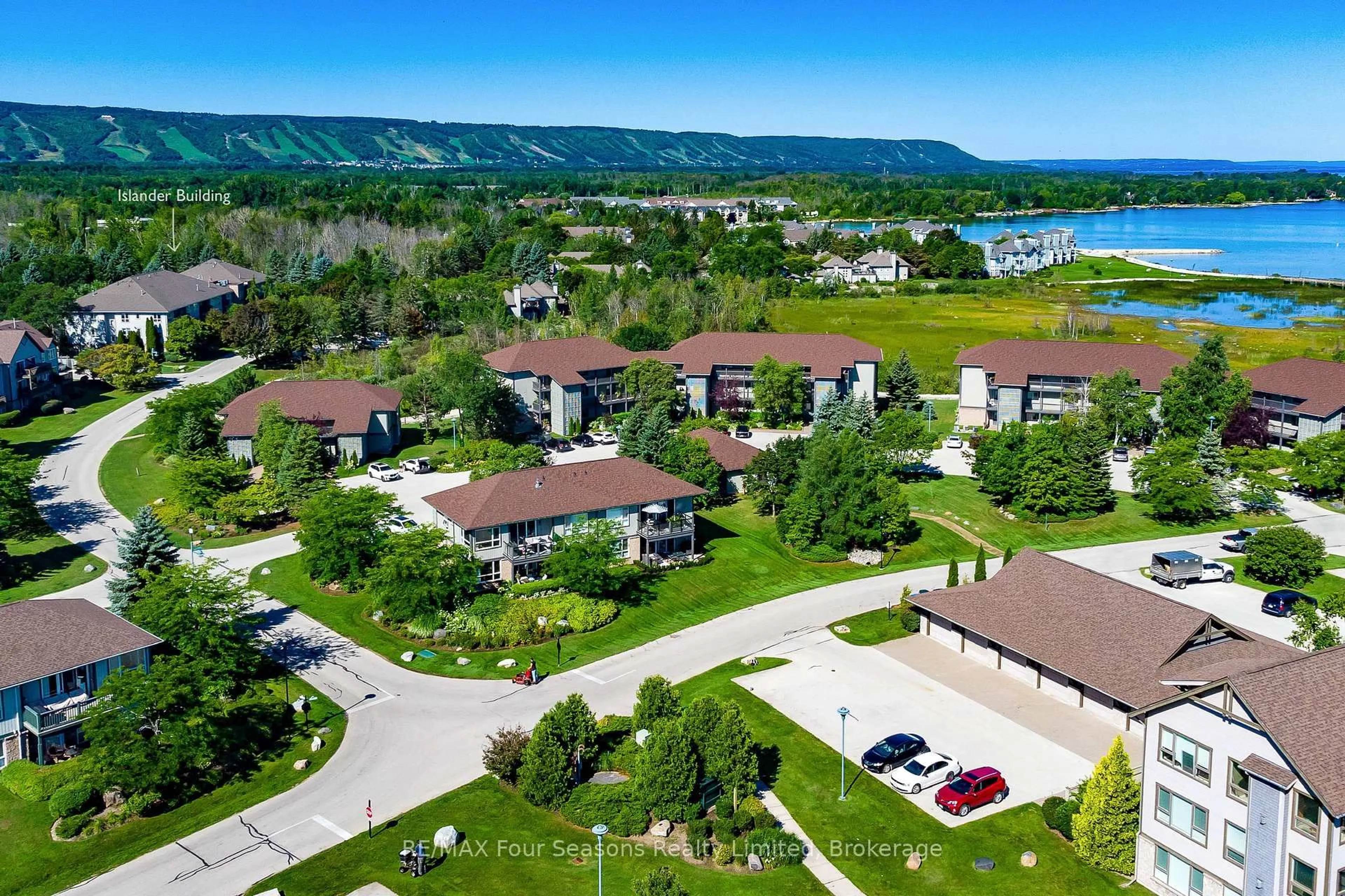 A pic from outside/outdoor area/front of a property/back of a property/a pic from drone, water/lake/river/ocean view for 750 Johnston Park Ave #2012, Collingwood Ontario L9Y 5C7