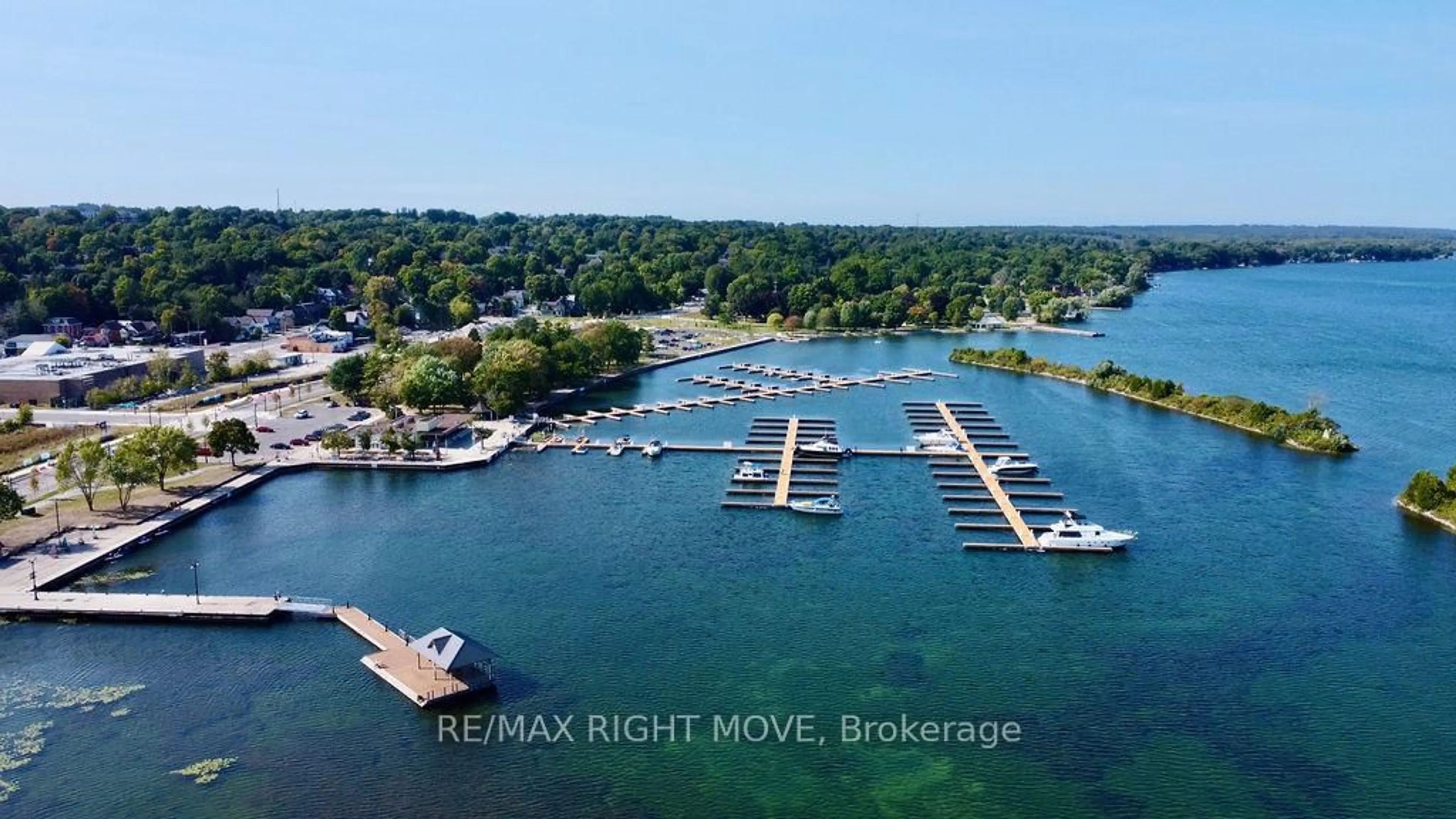 A pic from outside/outdoor area/front of a property/back of a property/a pic from drone, water/lake/river/ocean view for 140 Cedar Island Rd #410, Orillia Ontario L3V 1T1