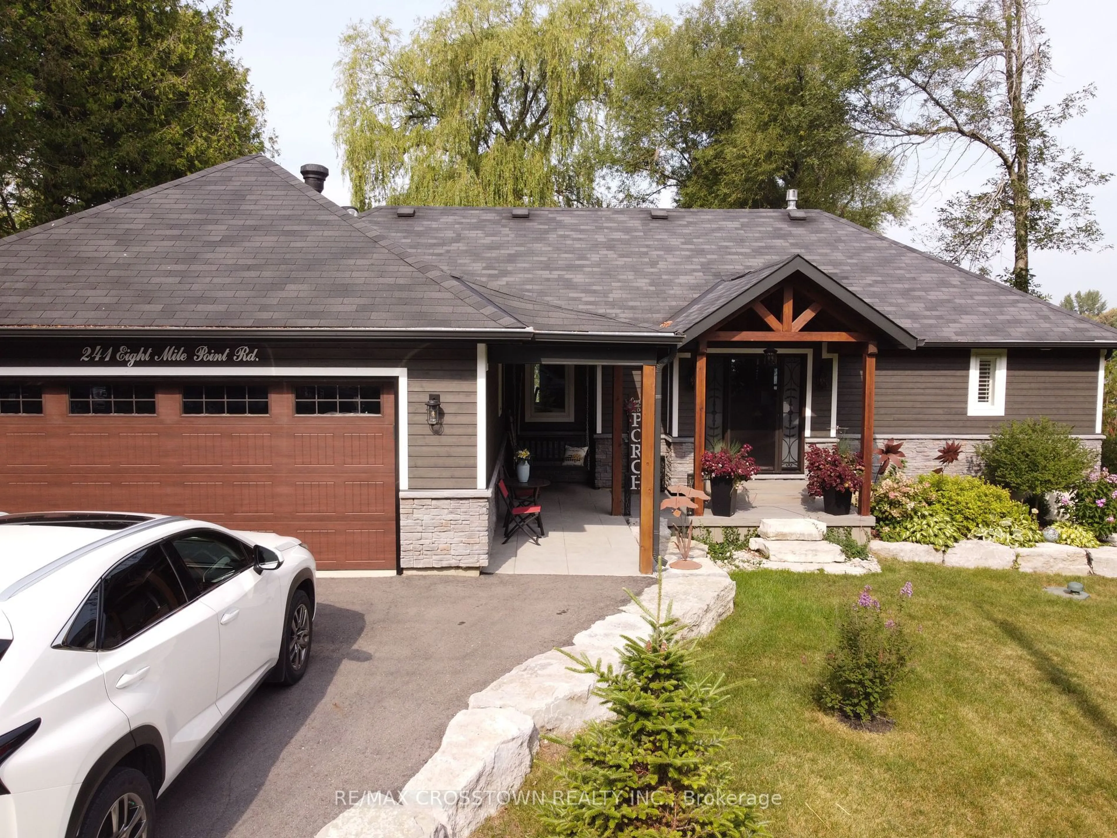 Home with vinyl exterior material, street for 241 Eight Mile Point Rd, Oro-Medonte Ontario L3V 6H1