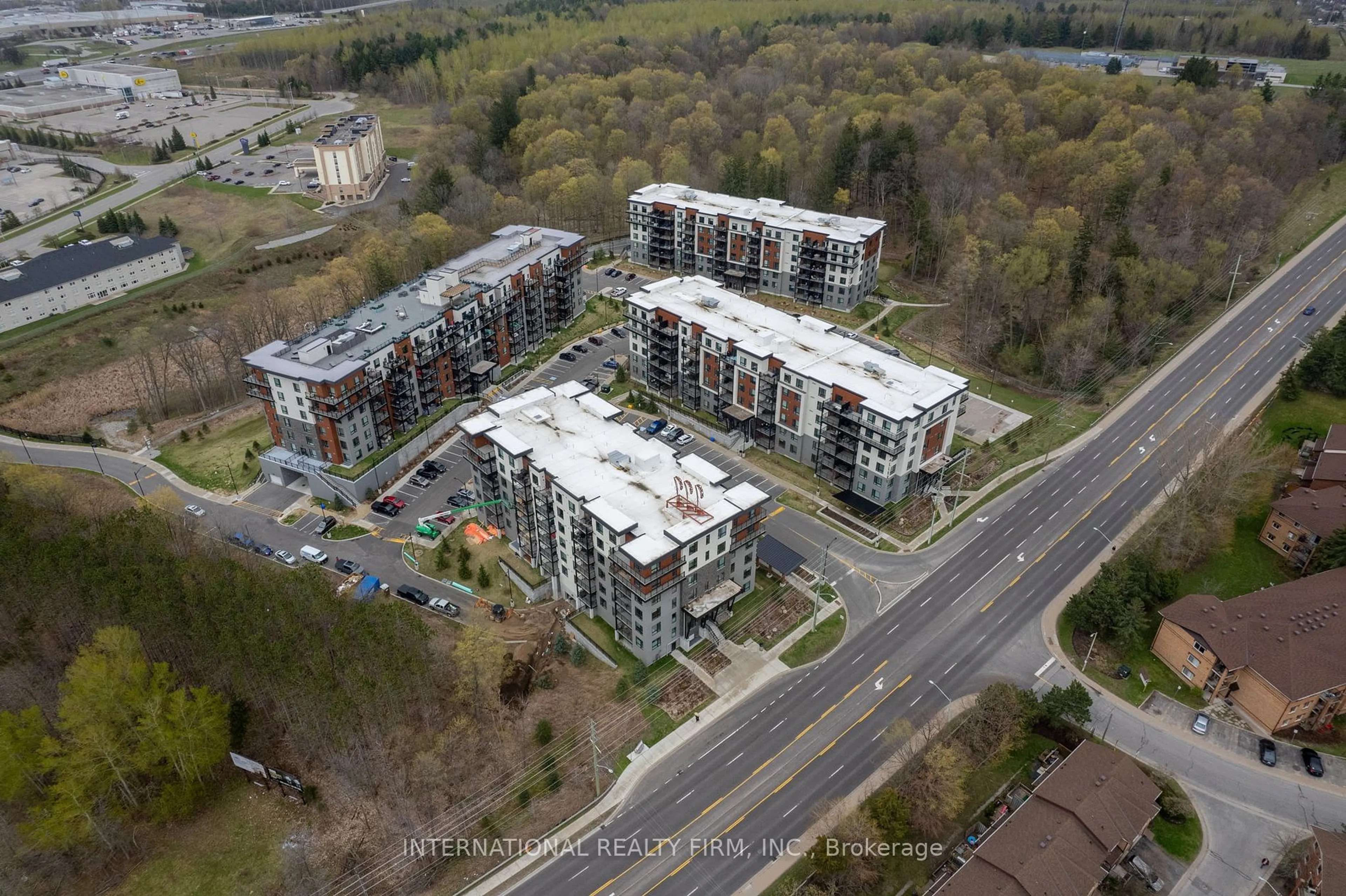 A pic from outside/outdoor area/front of a property/back of a property/a pic from drone, unknown for 306 Essa Rd #202, Barrie Ontario L9J 0H5