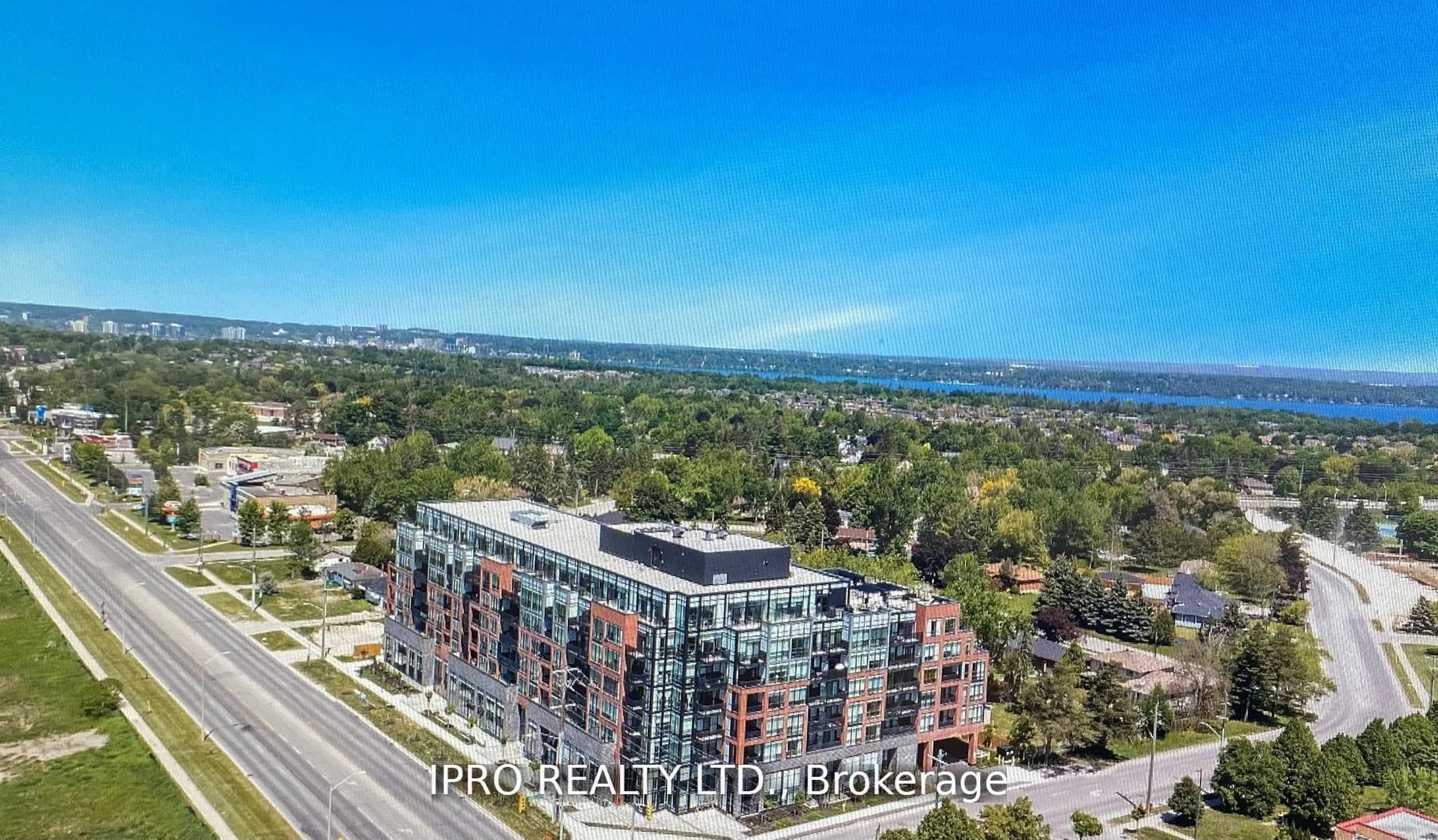 A pic from outside/outdoor area/front of a property/back of a property/a pic from drone, city buildings view from balcony for 681 Yonge St #110, Barrie Ontario L9J 0K1