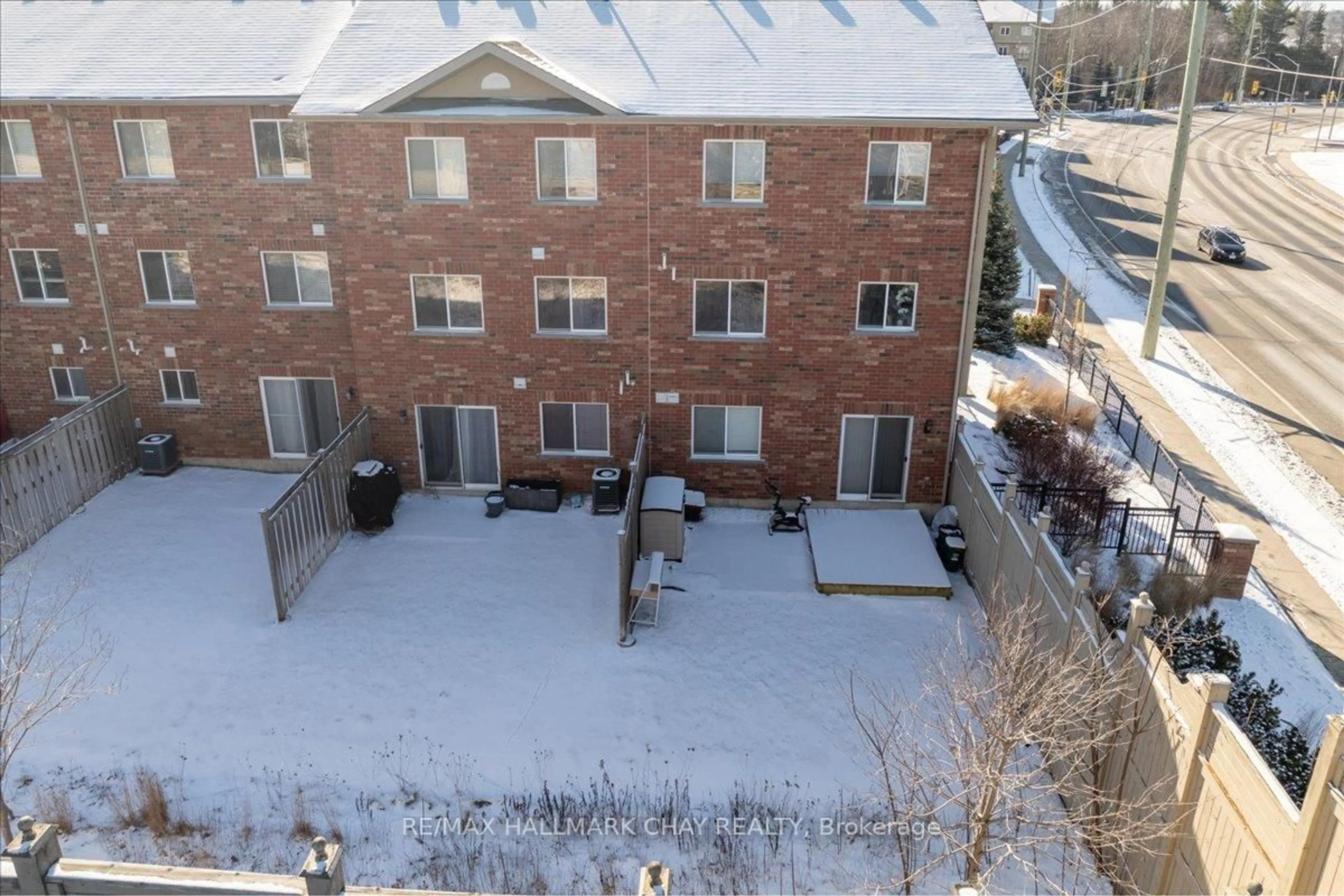 A pic from outside/outdoor area/front of a property/back of a property/a pic from drone, unknown for 57 FERNDALE Dr #1, Barrie Ontario L4N 5W9