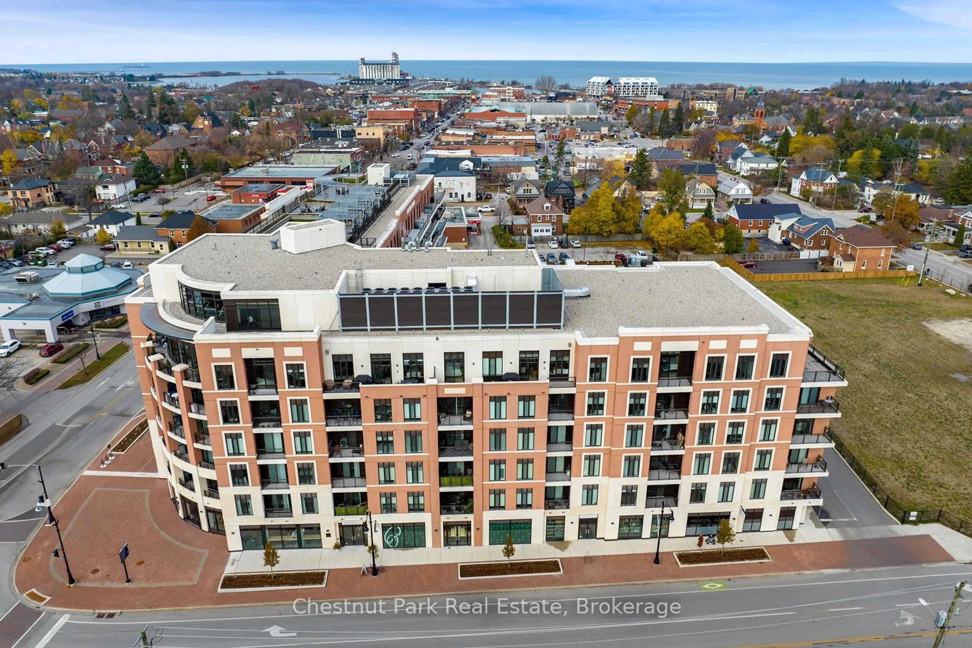 A pic from outside/outdoor area/front of a property/back of a property/a pic from drone, city buildings view from balcony for 1 Hume St #202, Collingwood Ontario L9Y 0X3