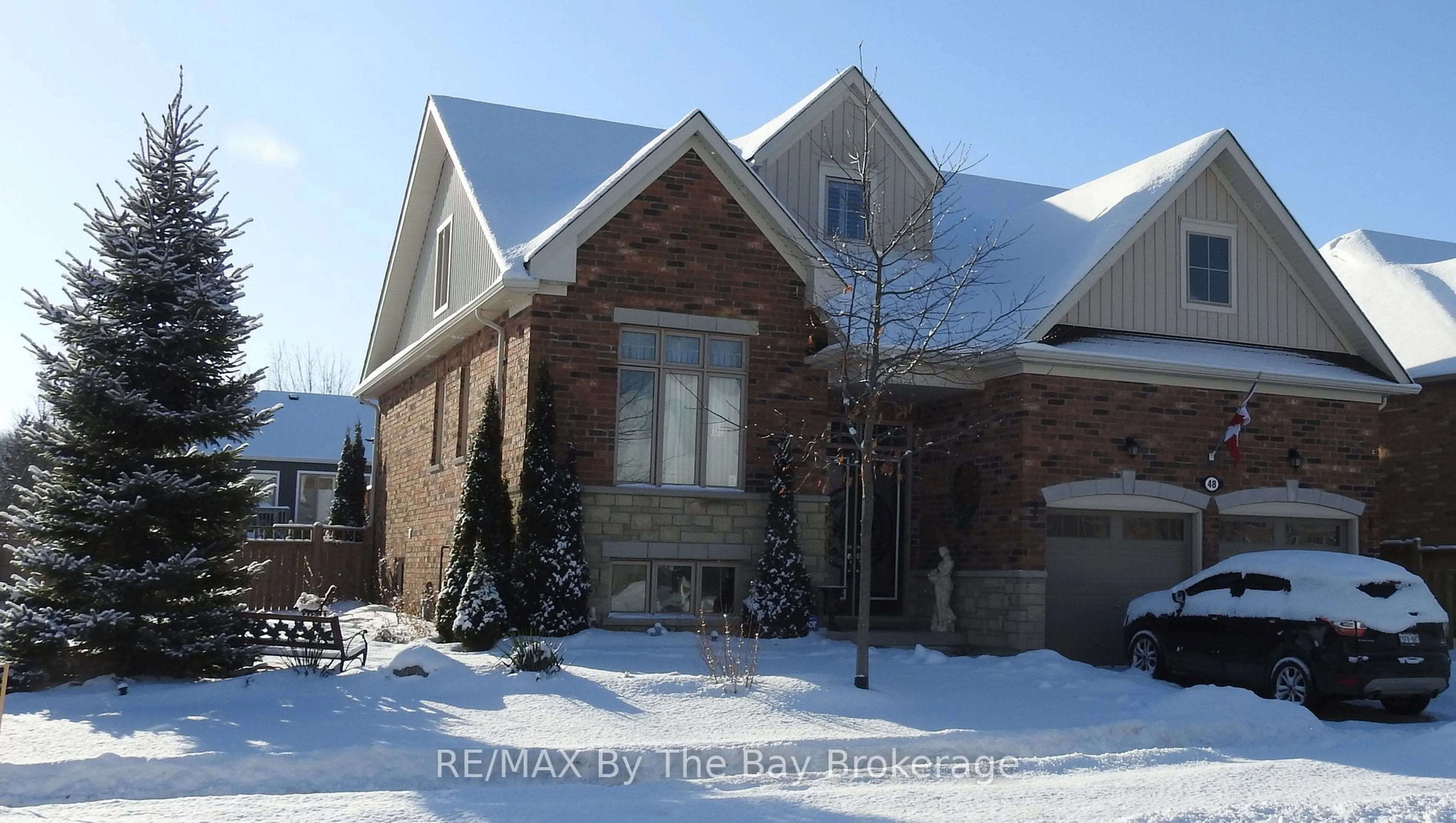 Home with brick exterior material, street for 48 Allegra Dr, Wasaga Beach Ontario L9Z 0H1