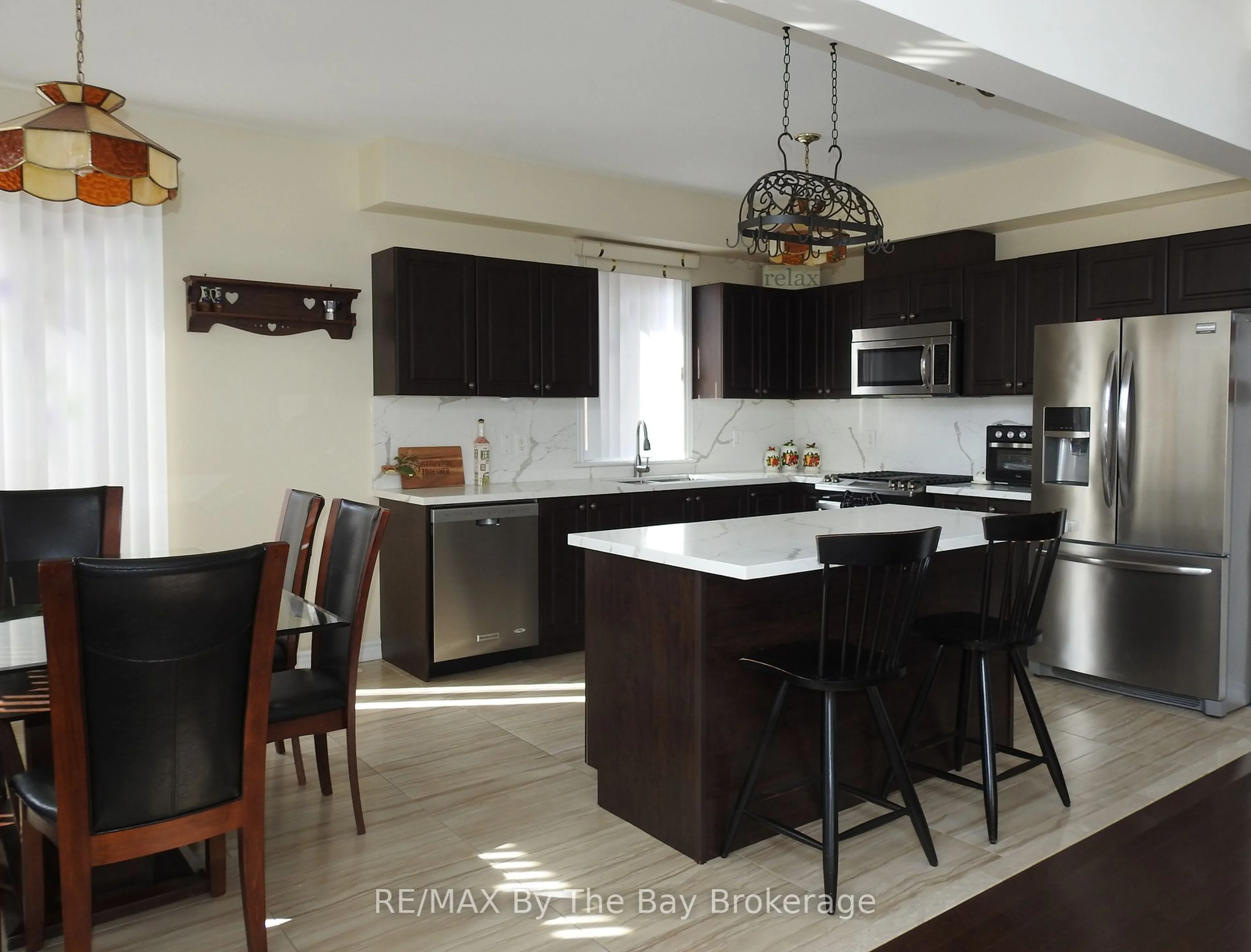 Open concept kitchen, unknown for 48 Allegra Dr, Wasaga Beach Ontario L9Z 0H1