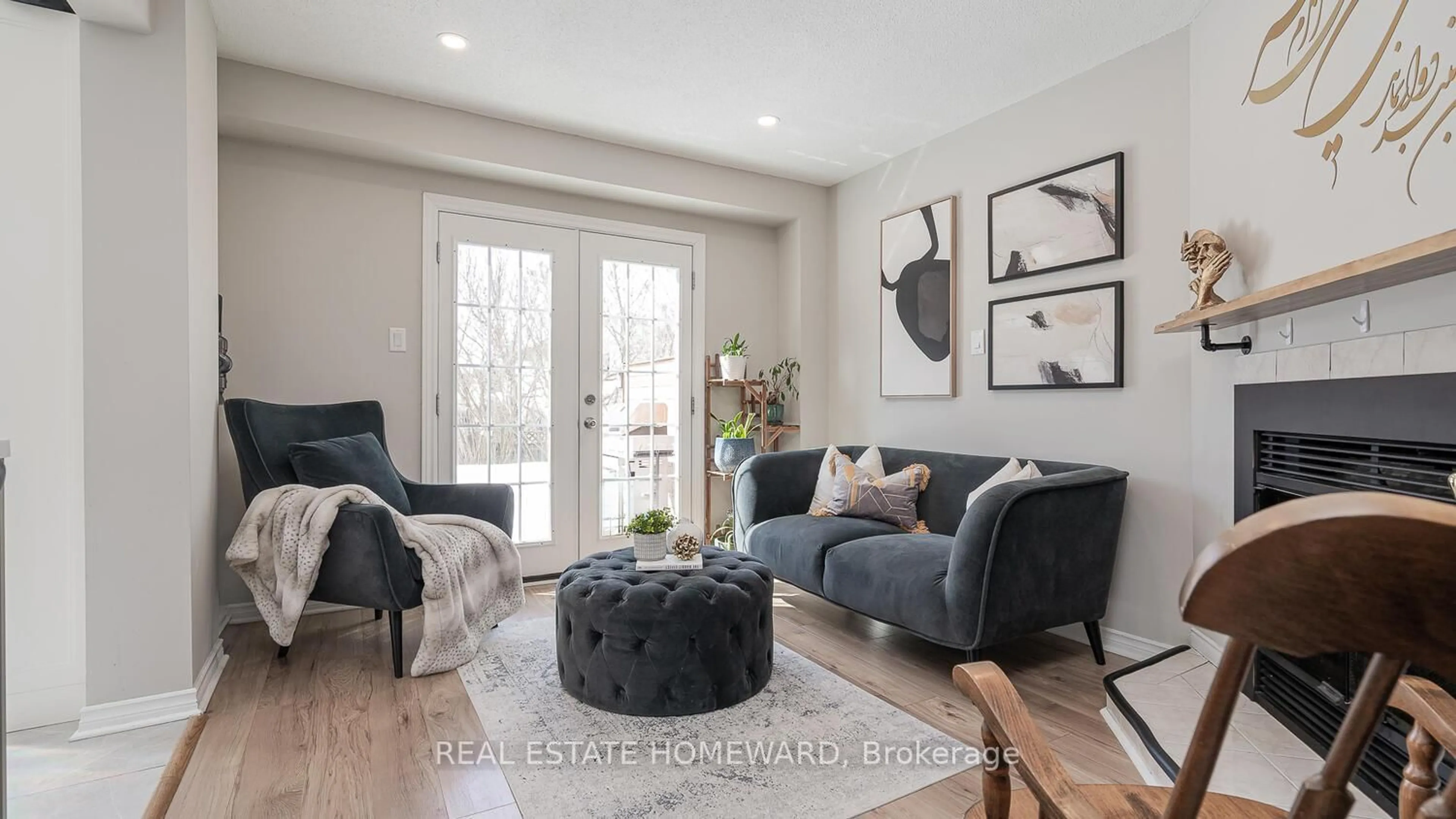 Living room with furniture, wood/laminate floor for 81 Hadden Cres, Barrie Ontario L4M 6G7