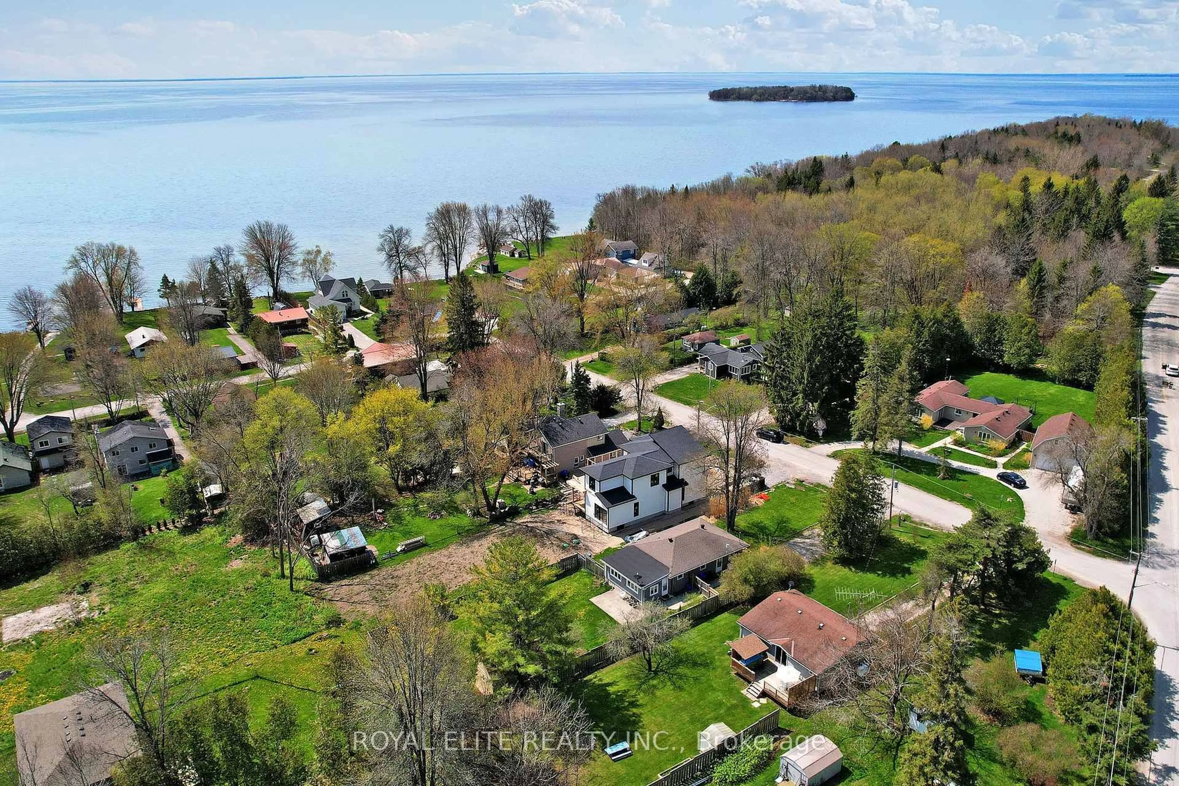 A pic from outside/outdoor area/front of a property/back of a property/a pic from drone, water/lake/river/ocean view for 3965 Hilltop Rd, Ramara Ontario L3V 6H7