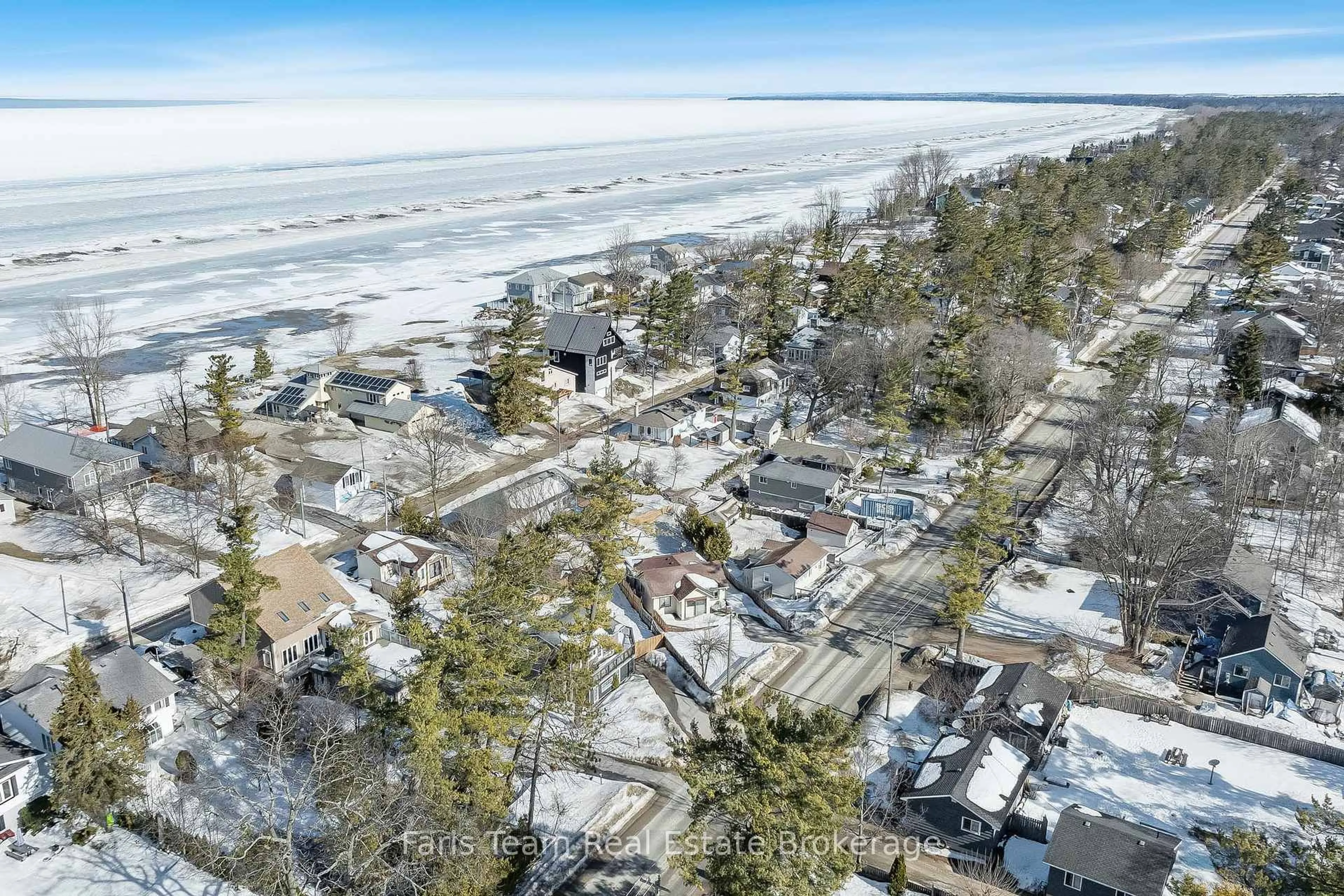 A pic from outside/outdoor area/front of a property/back of a property/a pic from drone, water/lake/river/ocean view for 704 Mosley St, Wasaga Beach Ontario L9Z 1Z8