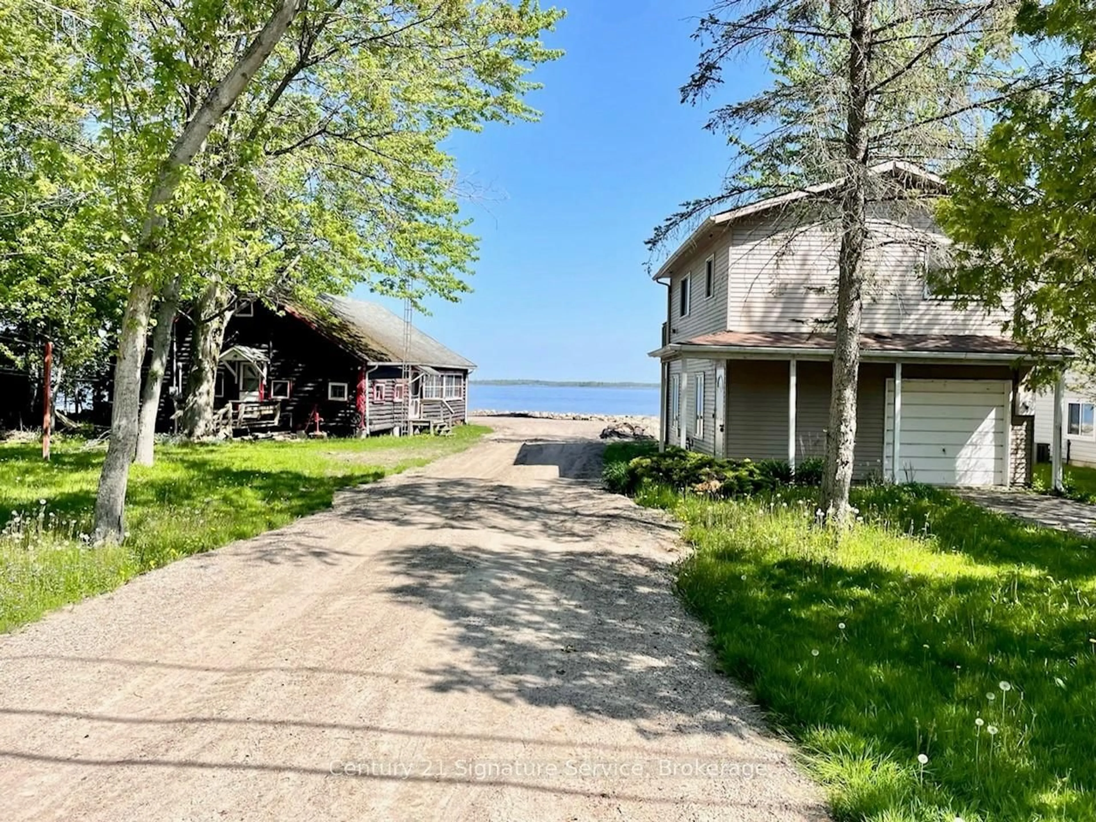 A pic from outside/outdoor area/front of a property/back of a property/a pic from drone, water/lake/river/ocean view for 264 Robins Point Rd, Tay Ontario L0K 2A0