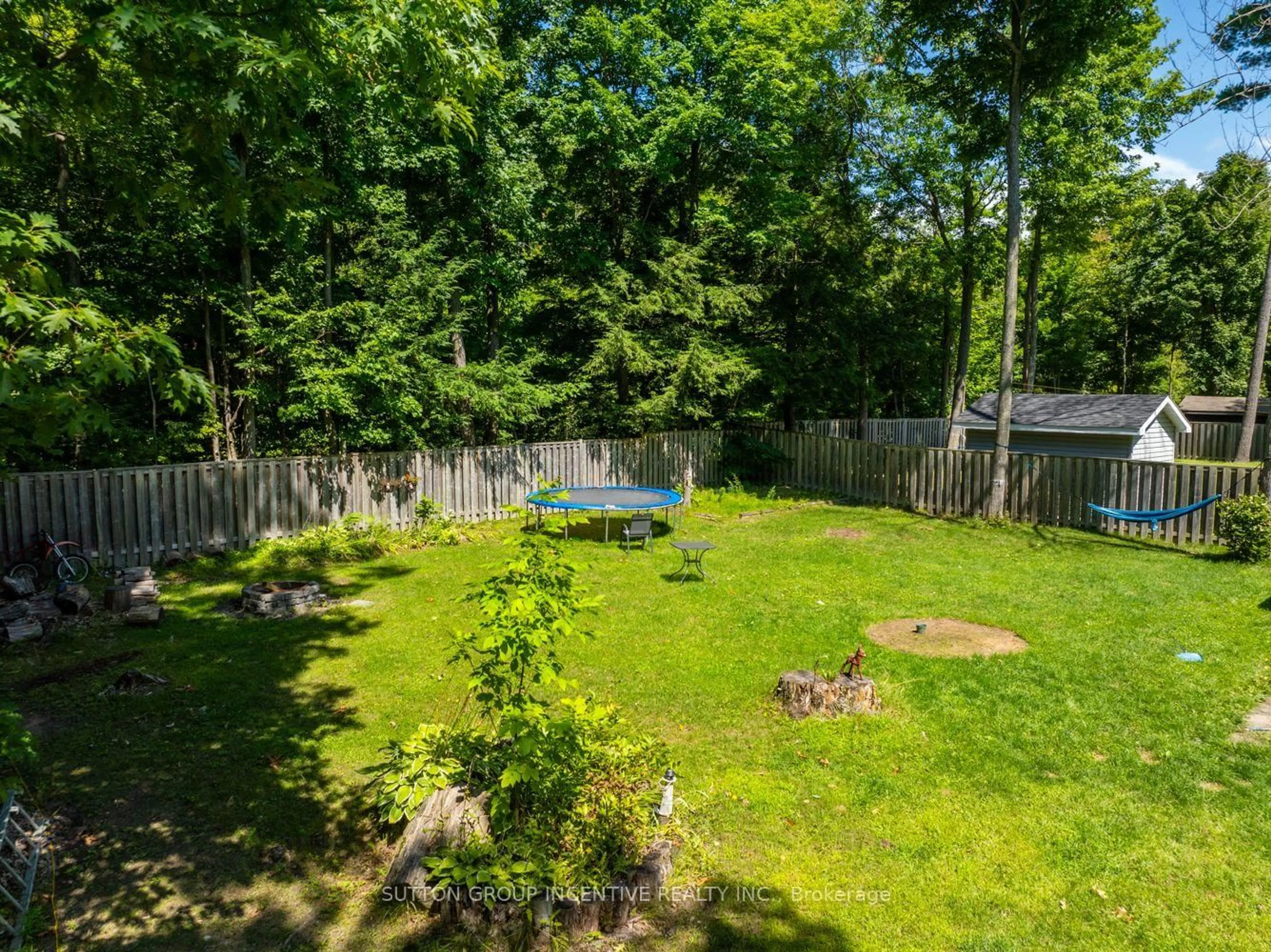 A pic from outside/outdoor area/front of a property/back of a property/a pic from drone, forest/trees view for 37 St. Laurent Blvd, Tiny Ontario L9M 0J2