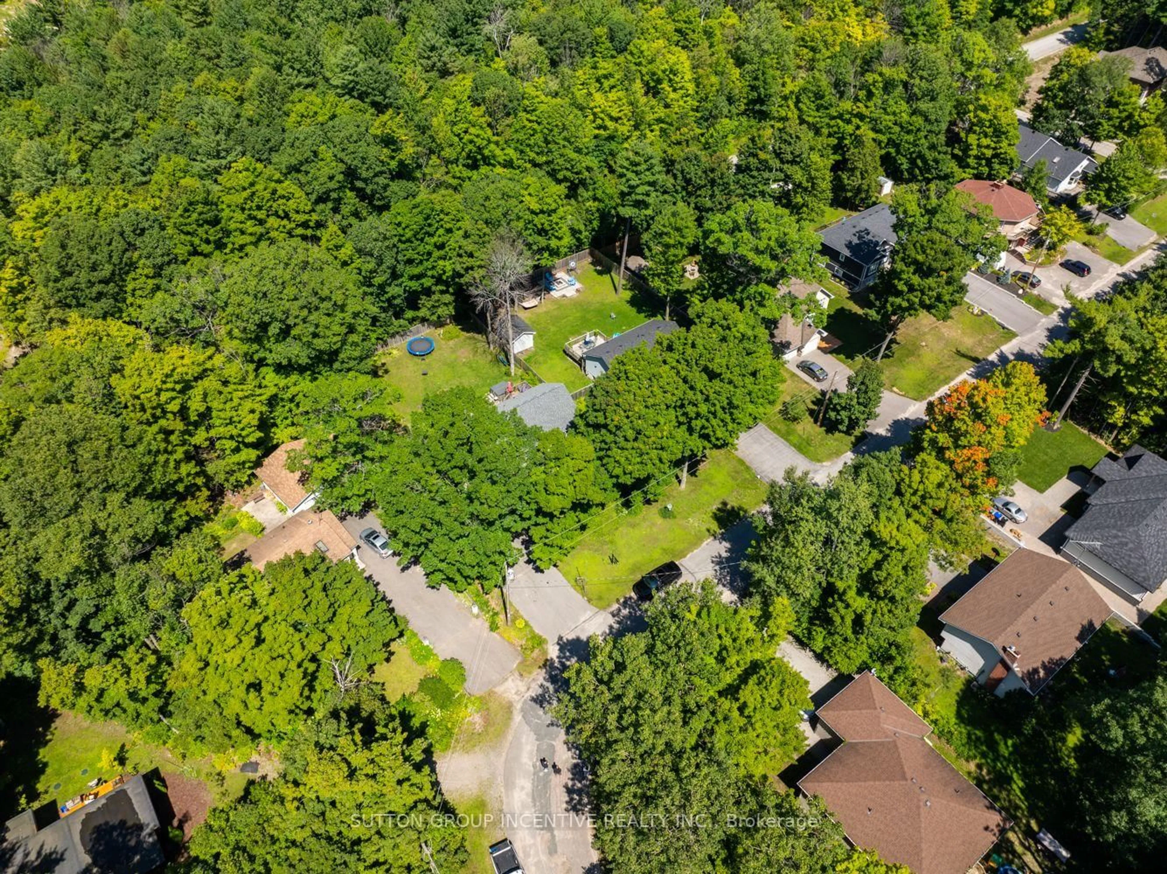 A pic from outside/outdoor area/front of a property/back of a property/a pic from drone, forest/trees view for 37 St. Laurent Blvd, Tiny Ontario L9M 0J2