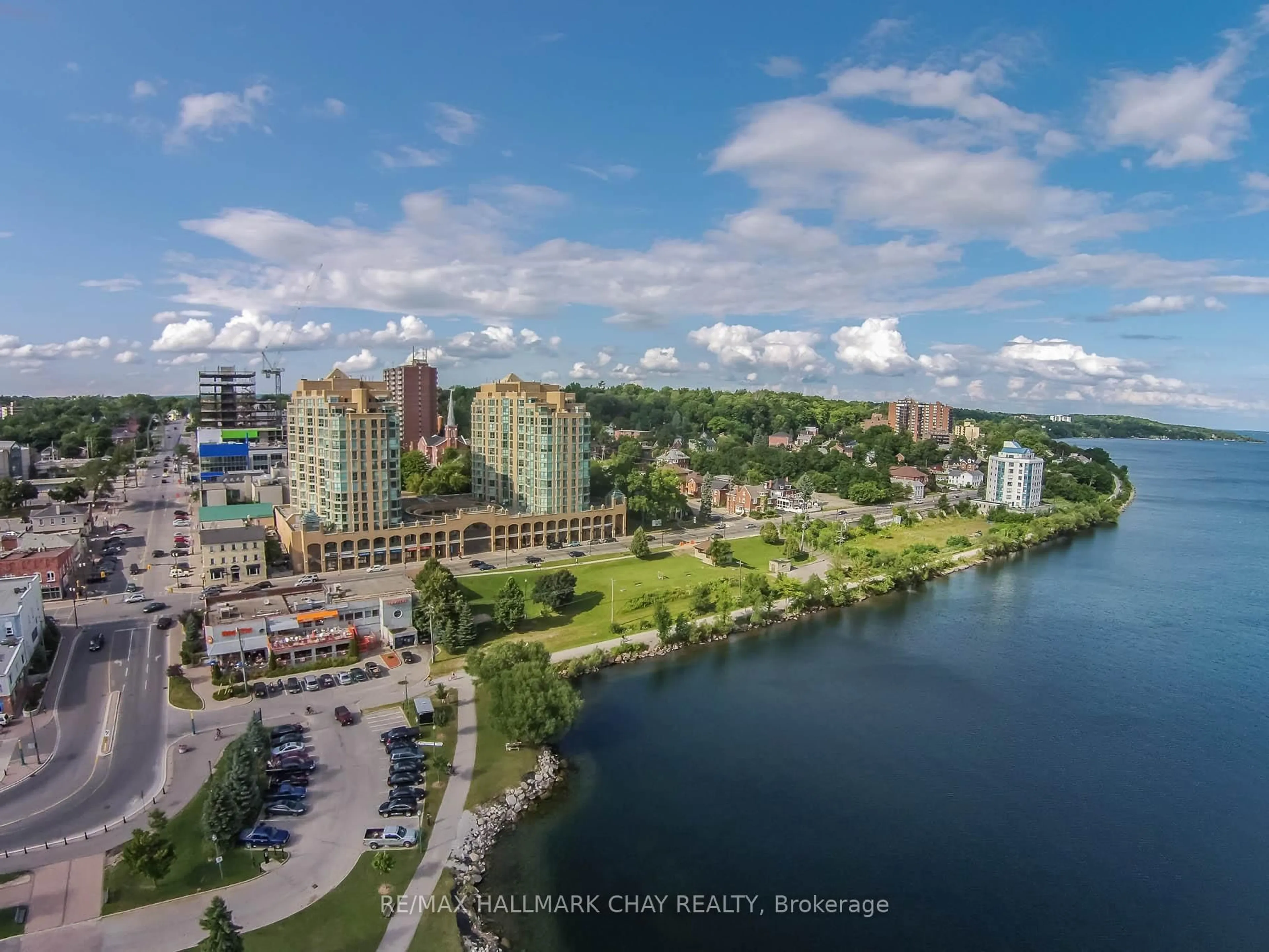 A pic from outside/outdoor area/front of a property/back of a property/a pic from drone, water/lake/river/ocean view for 140 Dunlop St #306, Barrie Ontario L4M 6H9