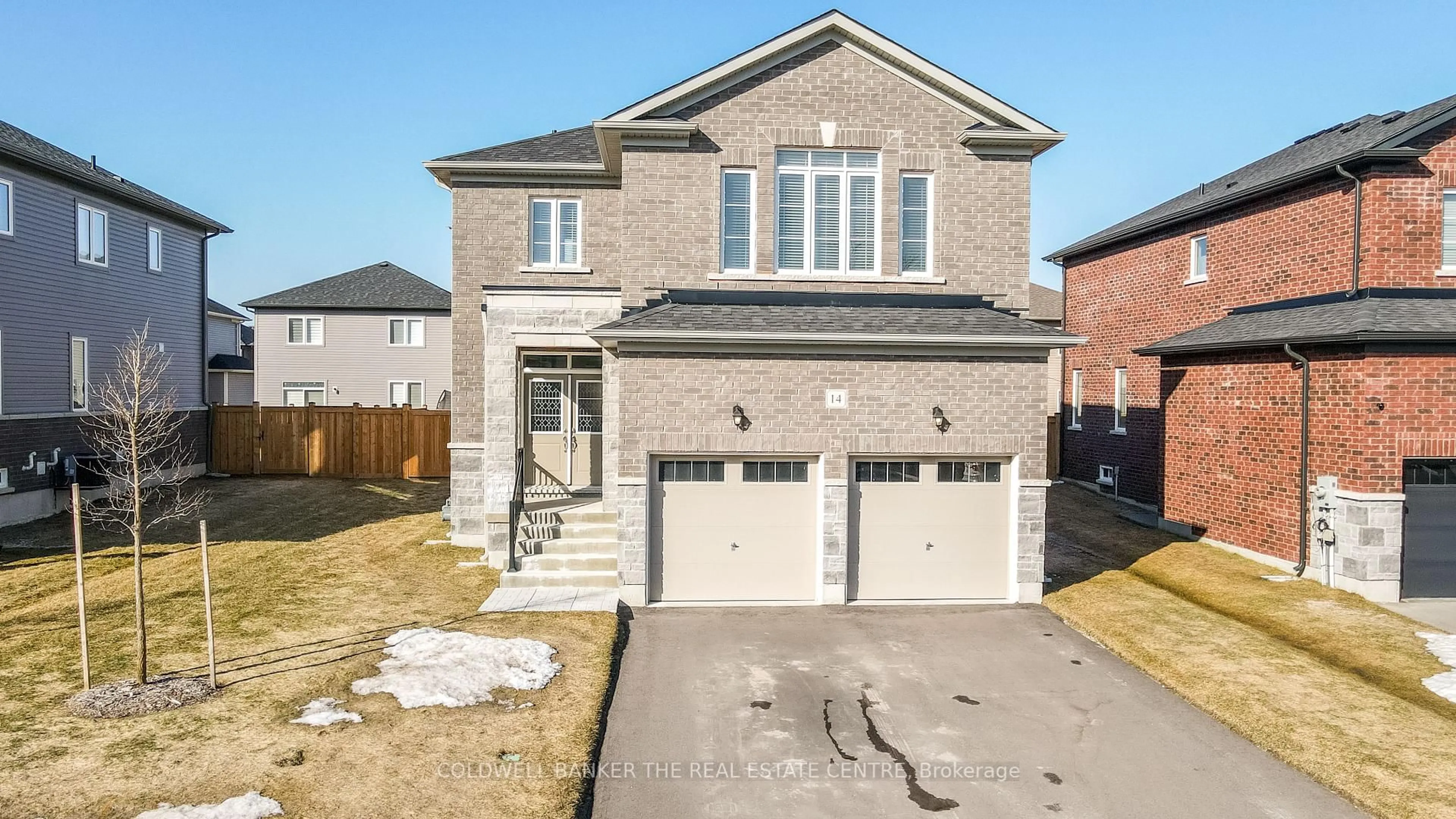 Home with brick exterior material, street for 14 Emerald St, Wasaga Beach Ontario L9Z 0K8