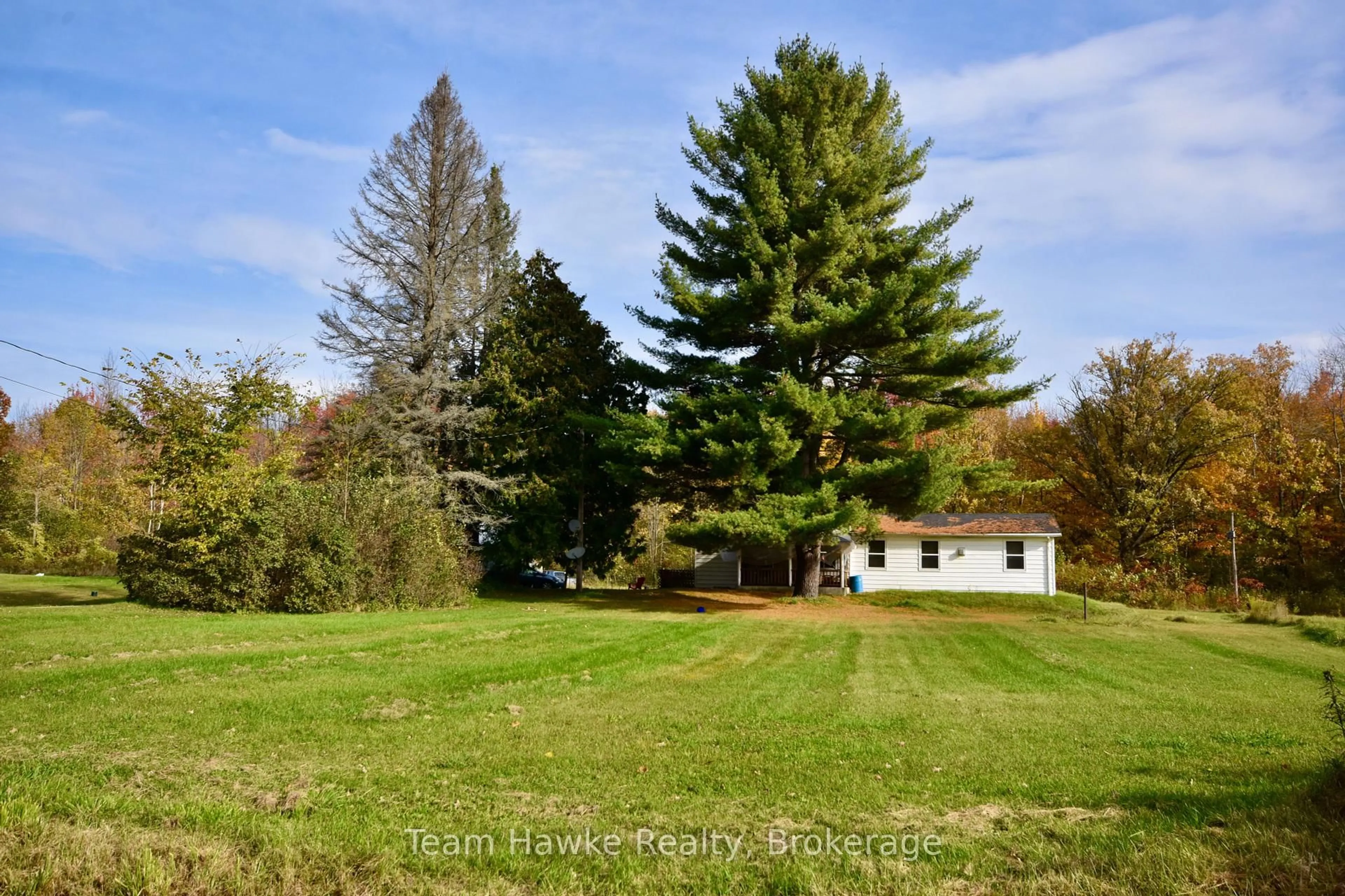 A pic from outside/outdoor area/front of a property/back of a property/a pic from drone, forest/trees view for 2645 ST AMANT Rd, Severn Ontario L0K 1S0