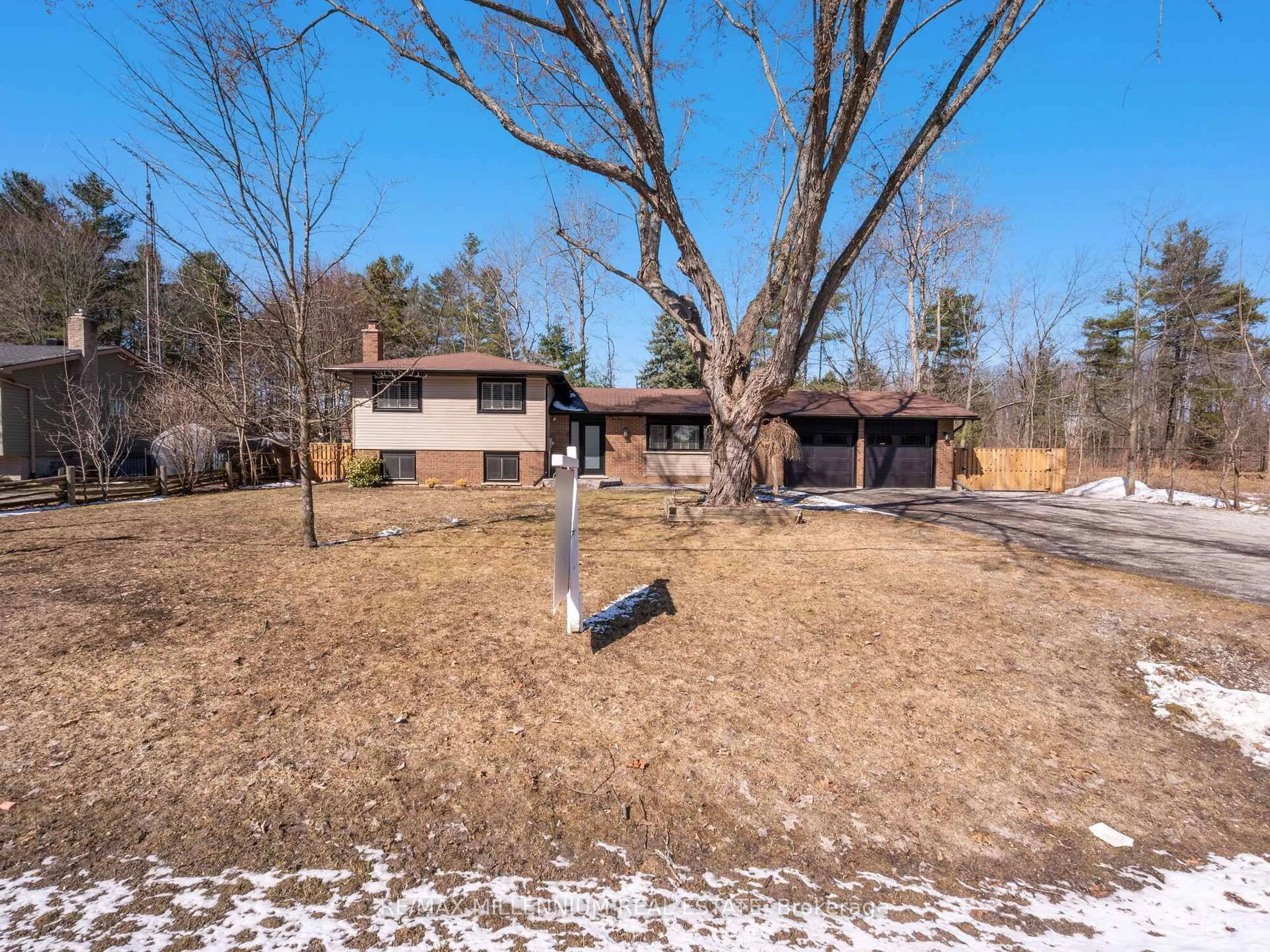 A pic from outside/outdoor area/front of a property/back of a property/a pic from drone, forest/trees view for 1030 Sunnidale Rd, Springwater Ontario L9X 0R9