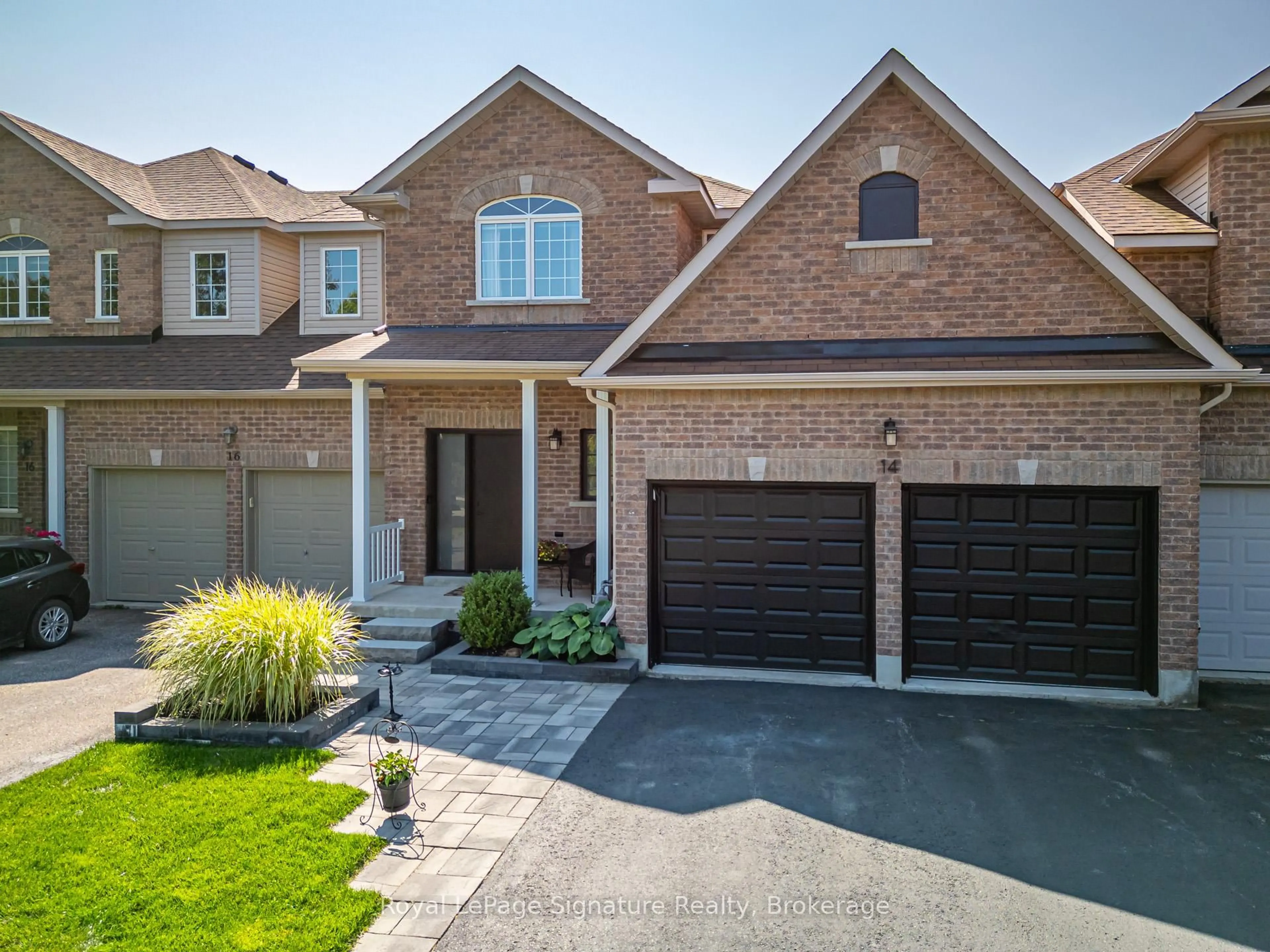 Home with brick exterior material, street for 14 Thomas Dr, Collingwood Ontario L9Y 0A6