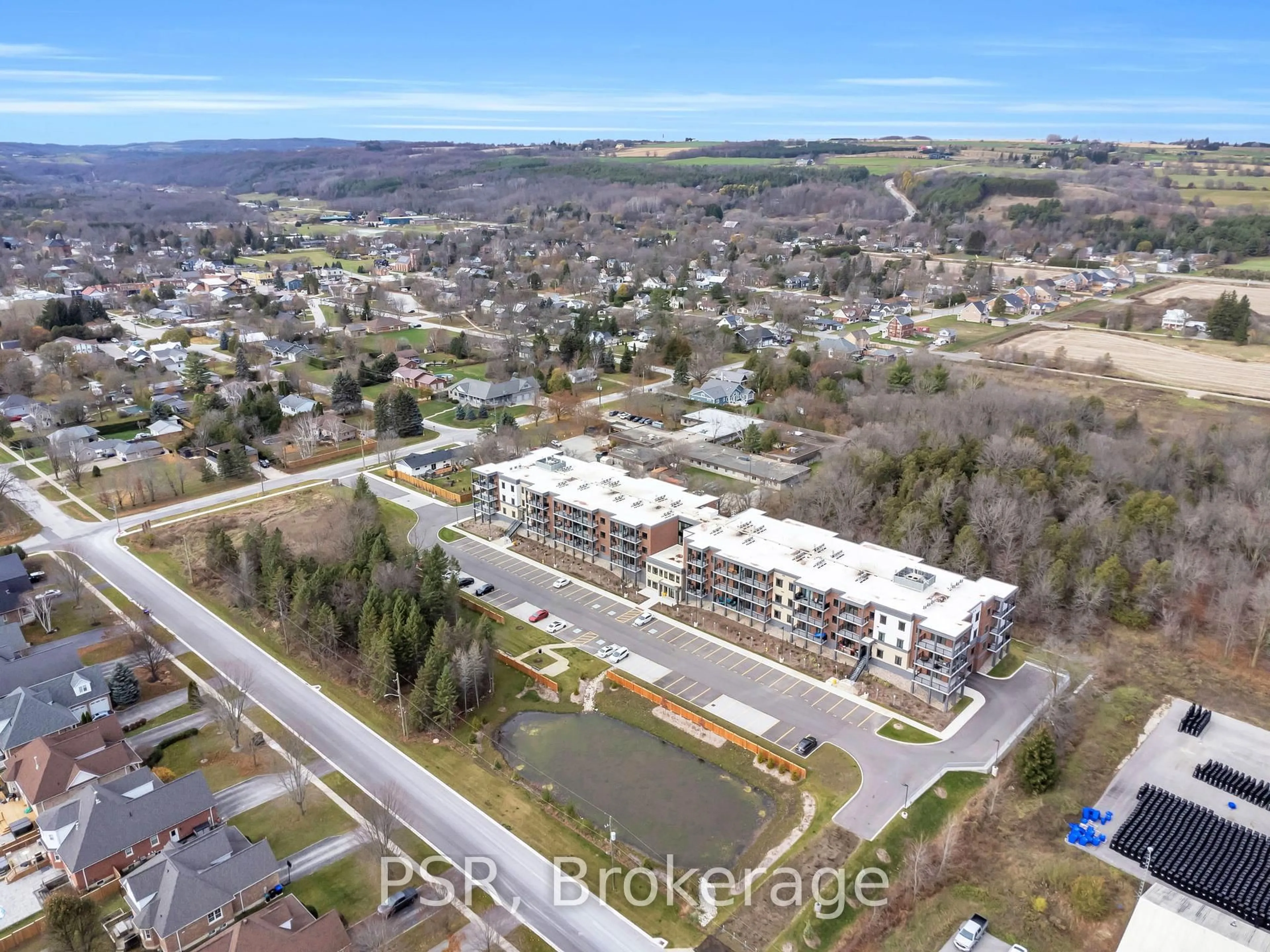 A pic from outside/outdoor area/front of a property/back of a property/a pic from drone, water/lake/river/ocean view for 121 Mary St #309, Clearview Ontario L0M 1G0