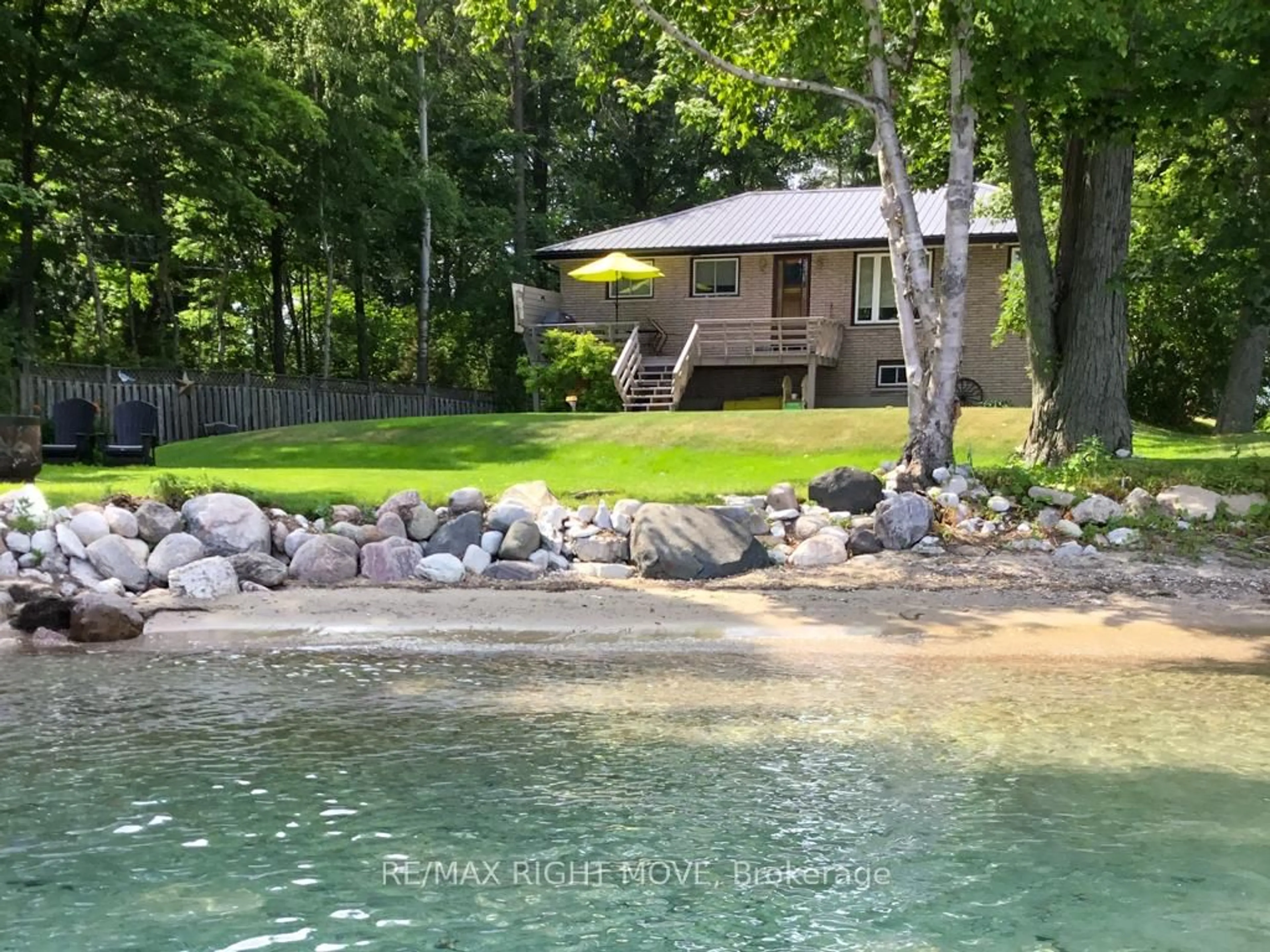 A pic from outside/outdoor area/front of a property/back of a property/a pic from drone, water/lake/river/ocean view for 713 Woodland Dr, Oro-Medonte Ontario L3V 0R8