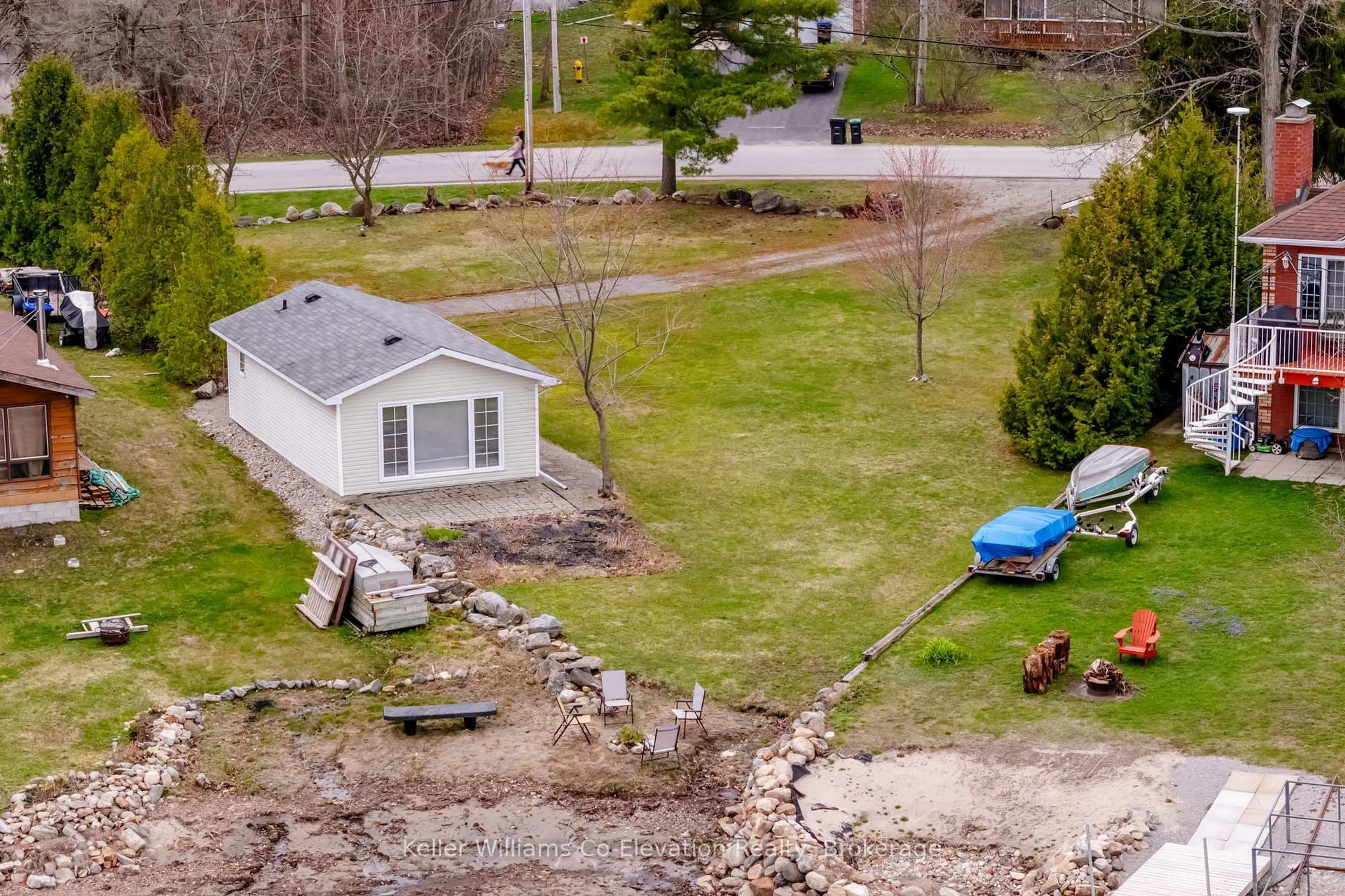 A pic from outside/outdoor area/front of a property/back of a property/a pic from drone, water/lake/river/ocean view for 220 Robin's Point Rd, Tay Ontario L0K 2A0
