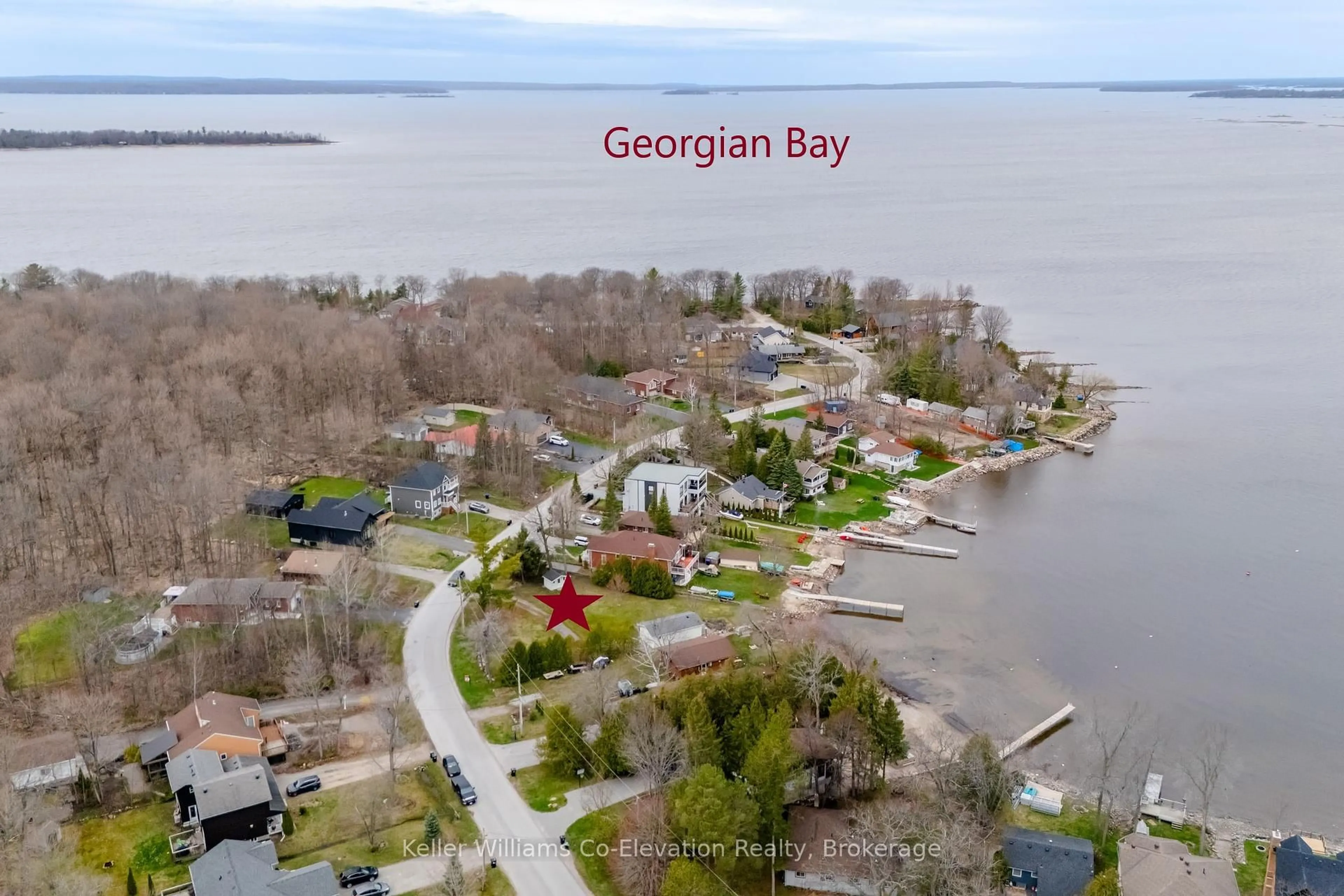 A pic from outside/outdoor area/front of a property/back of a property/a pic from drone, water/lake/river/ocean view for 220 Robin's Point Rd, Tay Ontario L0K 2A0