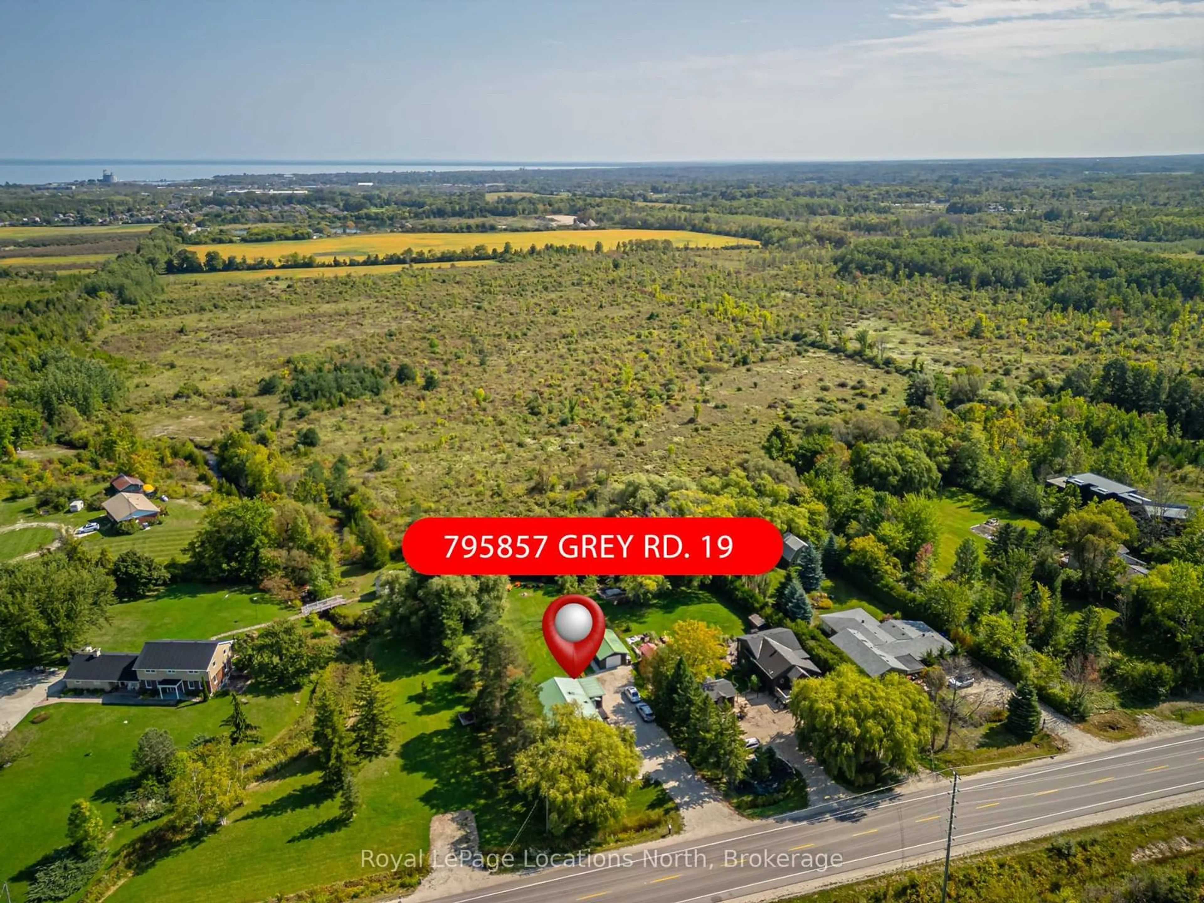 A pic from outside/outdoor area/front of a property/back of a property/a pic from drone, water/lake/river/ocean view for 795857 Grey Road 19 N/A, Collingwood Ontario L9Y 3Y9