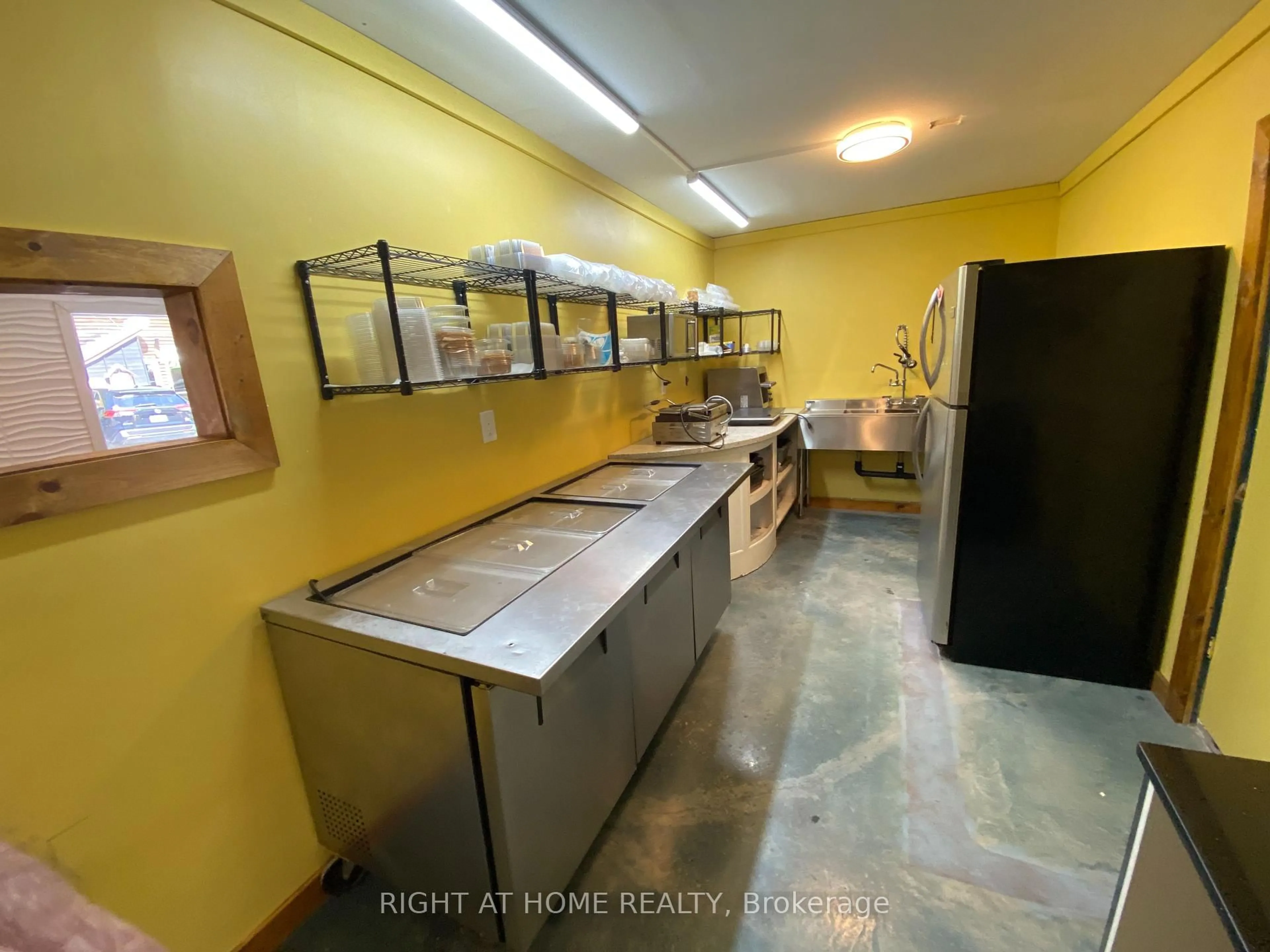 Kitchen with laundary machines, unknown for 1725 Earl Haid Ave, Severn Ontario L0K 1E0