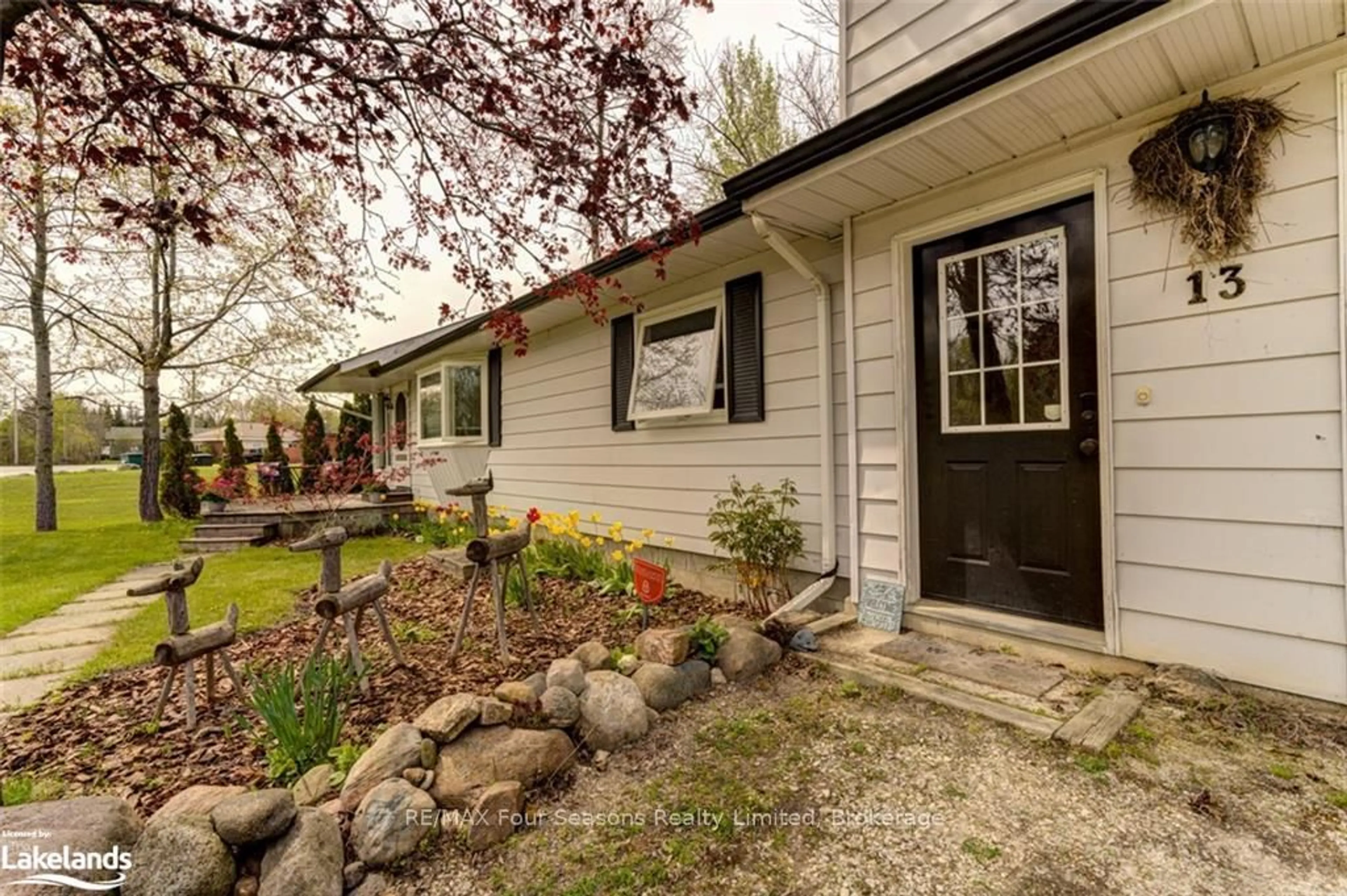 Home with vinyl exterior material, street for 13 Belcher St, Collingwood Ontario L9Y 3Z1