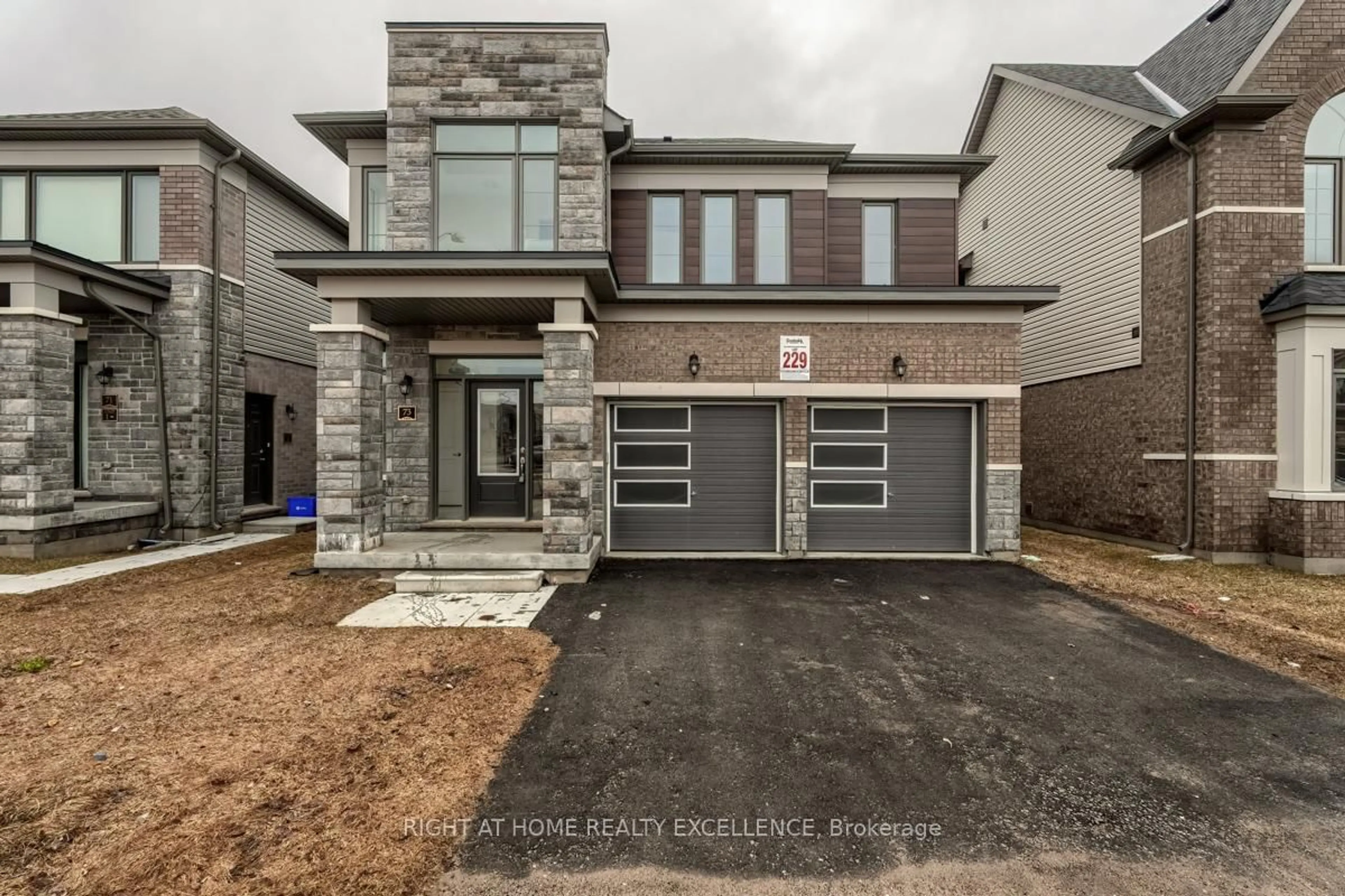 Home with brick exterior material, street for 73 Nottingham Rd, Barrie Ontario L9J 0L3
