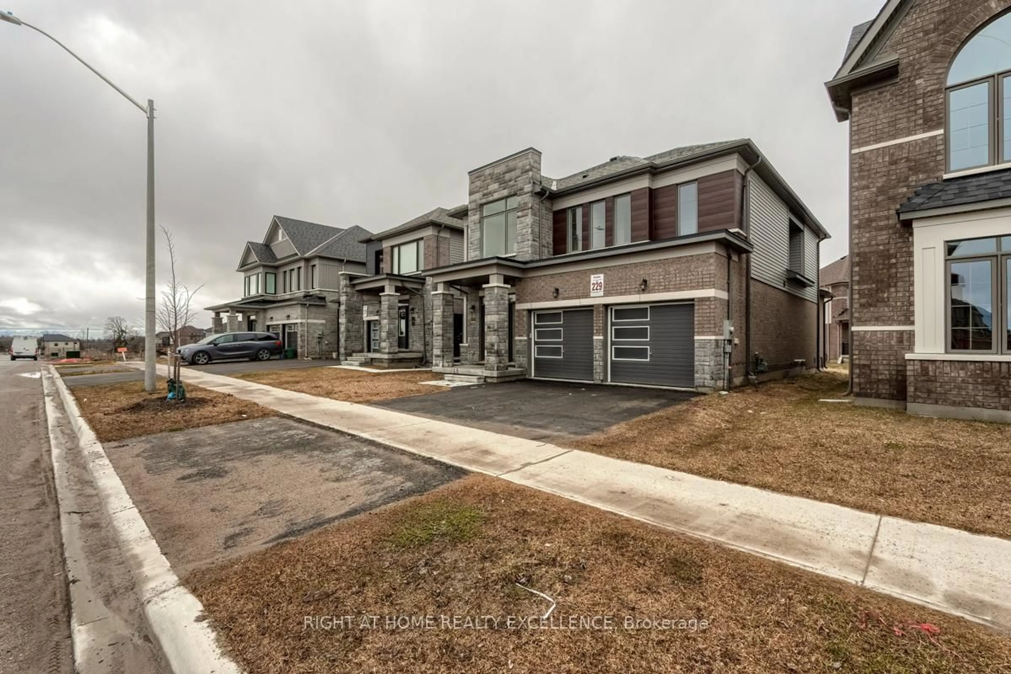 Home with brick exterior material, street for 73 Nottingham Rd, Barrie Ontario L9J 0L3