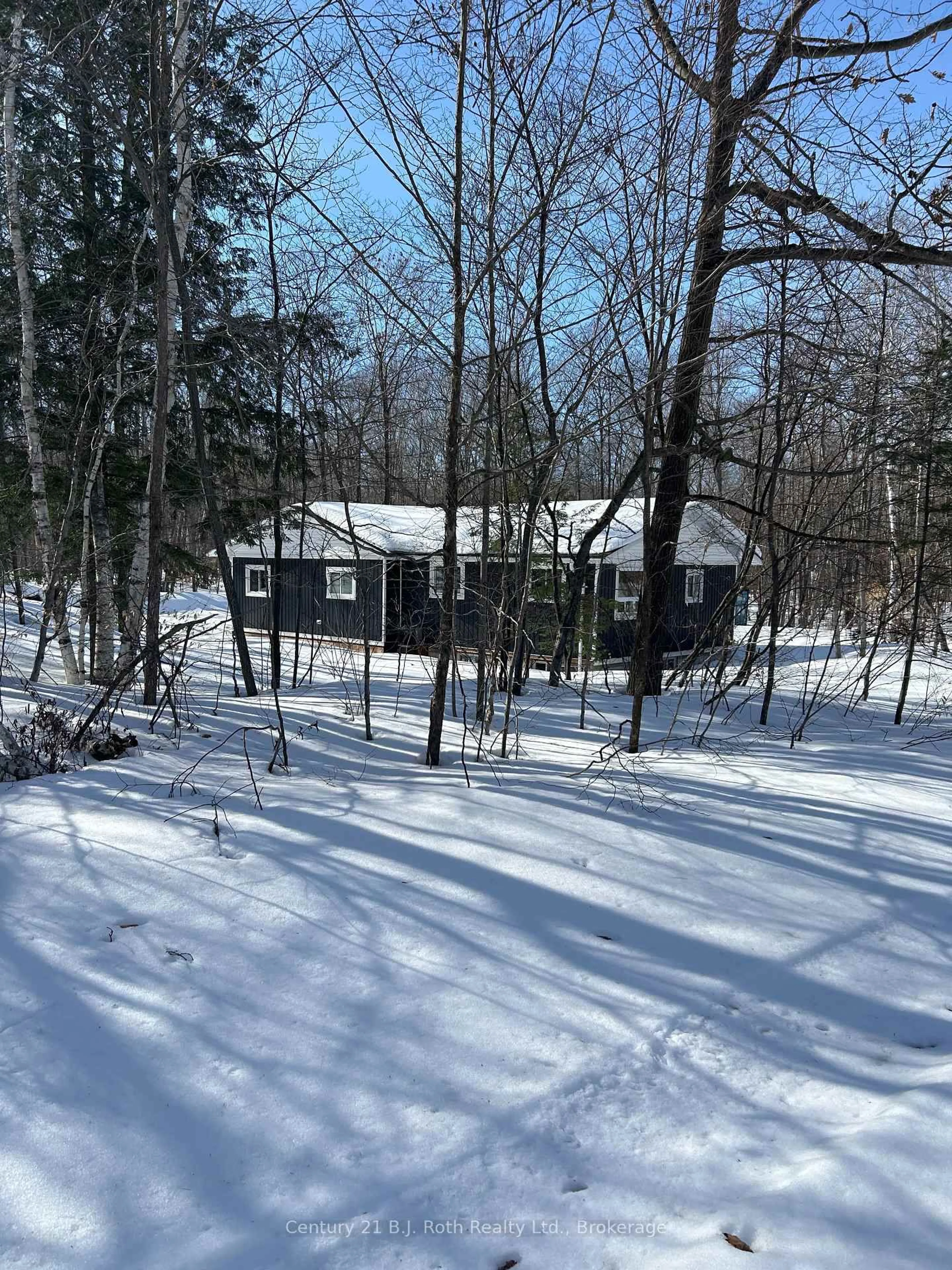A pic from outside/outdoor area/front of a property/back of a property/a pic from drone, forest/trees view for 1 Waagosh Miikaans Lane, Christian Island 30 Ontario L9M 0A9