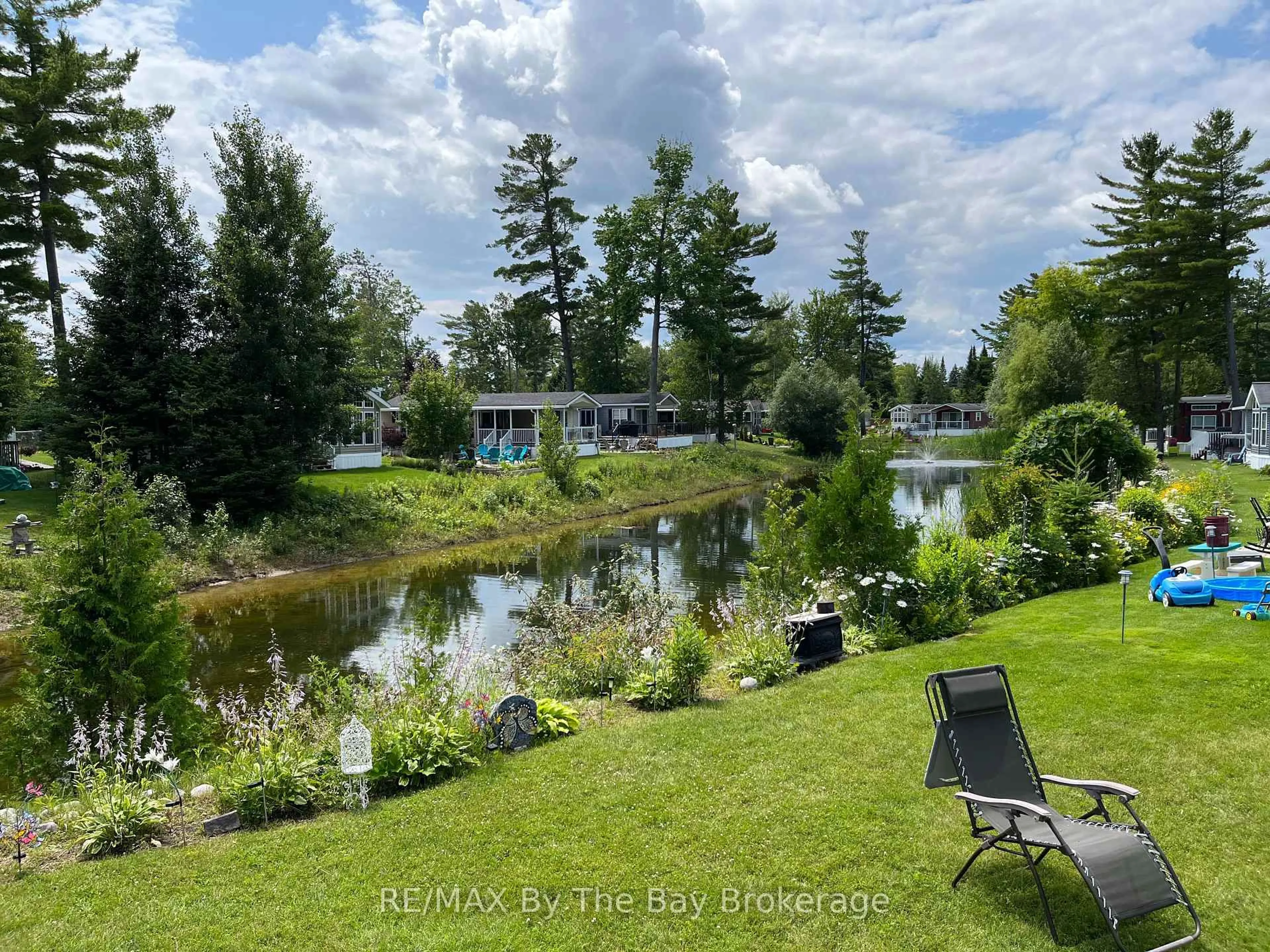 A pic from outside/outdoor area/front of a property/back of a property/a pic from drone, water/lake/river/ocean view for 15 Kenora Tr, Wasaga Beach Ontario L9Z 1X7