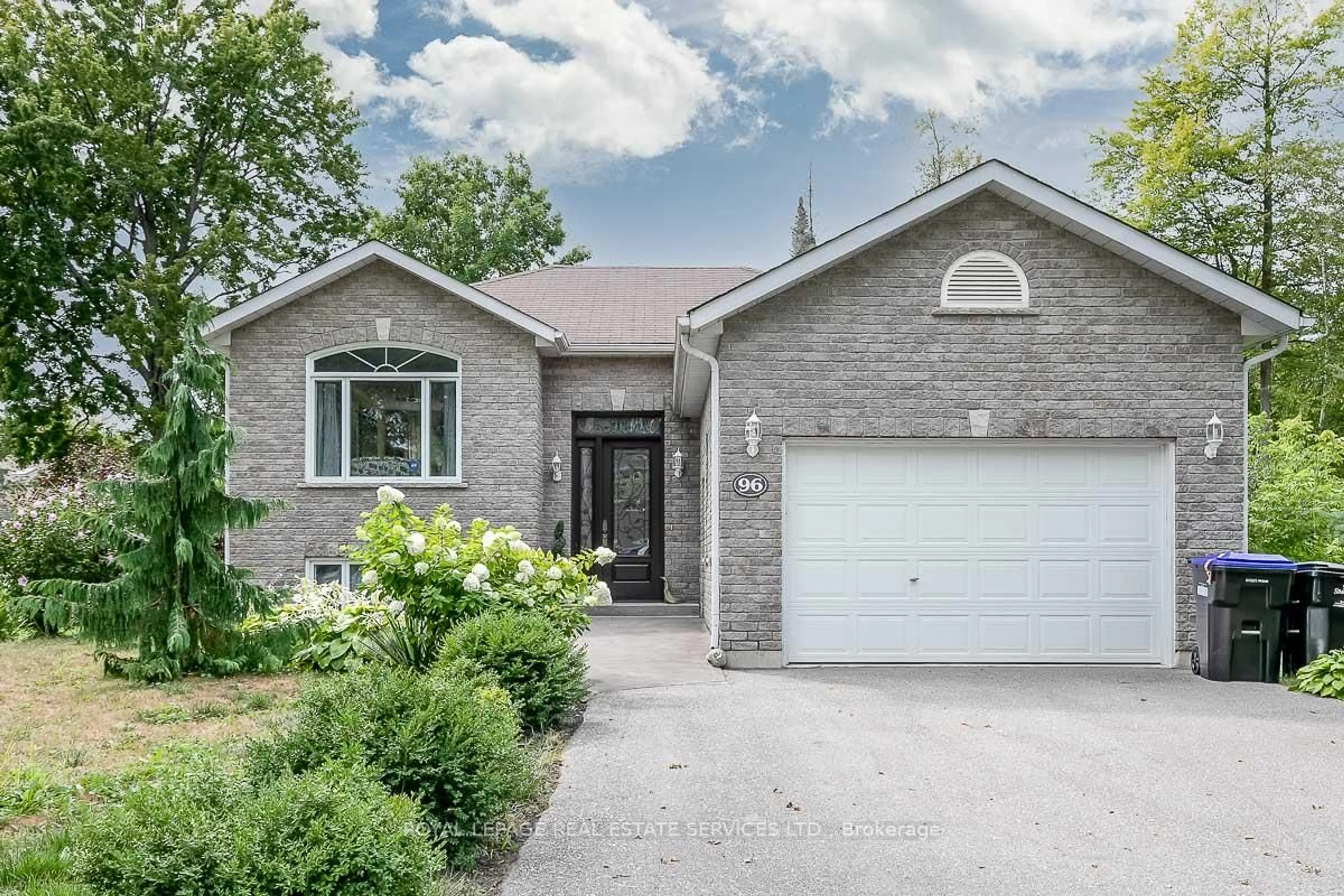 Home with brick exterior material, street for 96 46th St, Wasaga Beach Ontario L9Z 1Y7