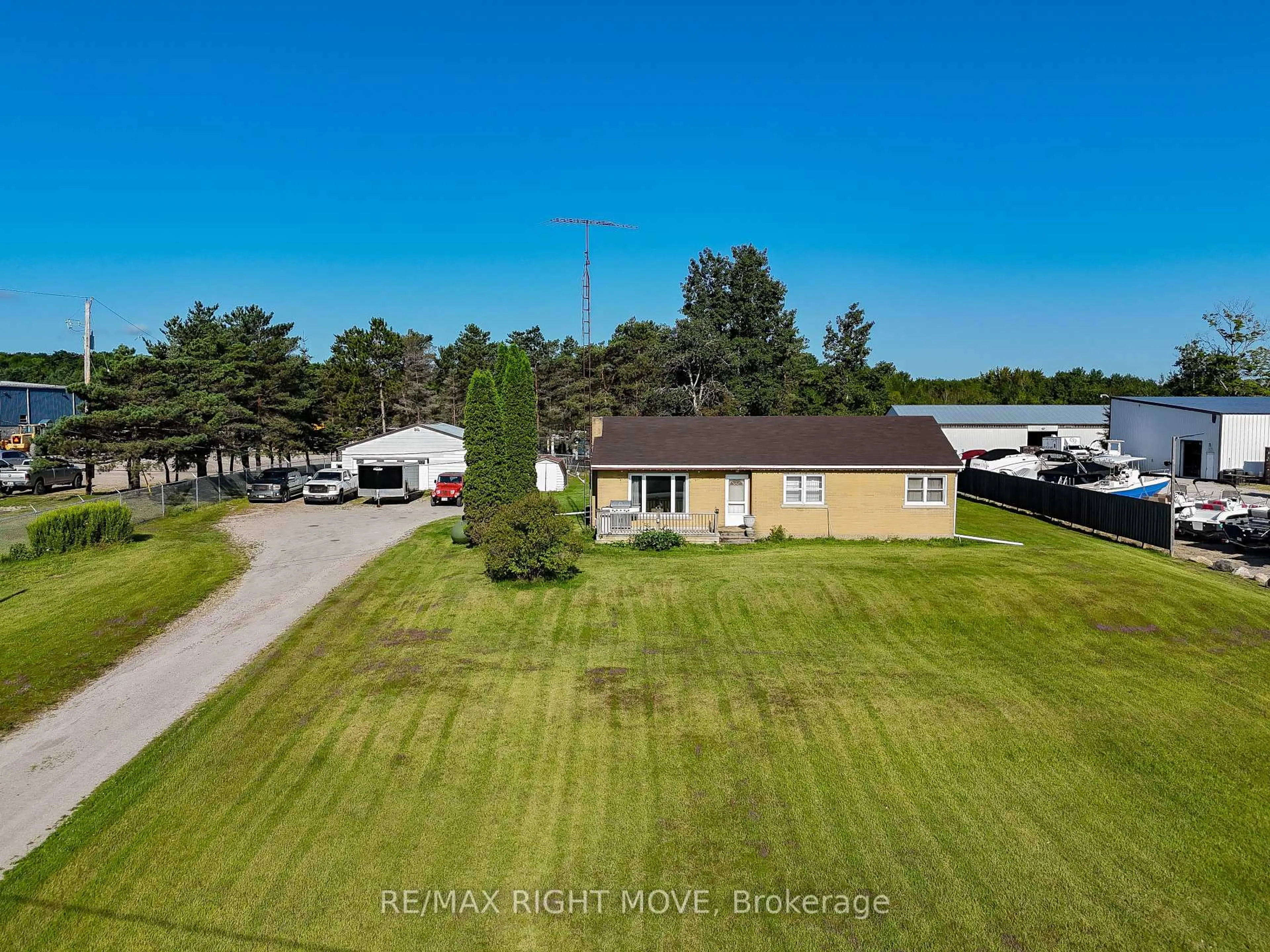 A pic from outside/outdoor area/front of a property/back of a property/a pic from drone, unknown for 4142 stewarts Lane, Severn Ontario L3V 6K6