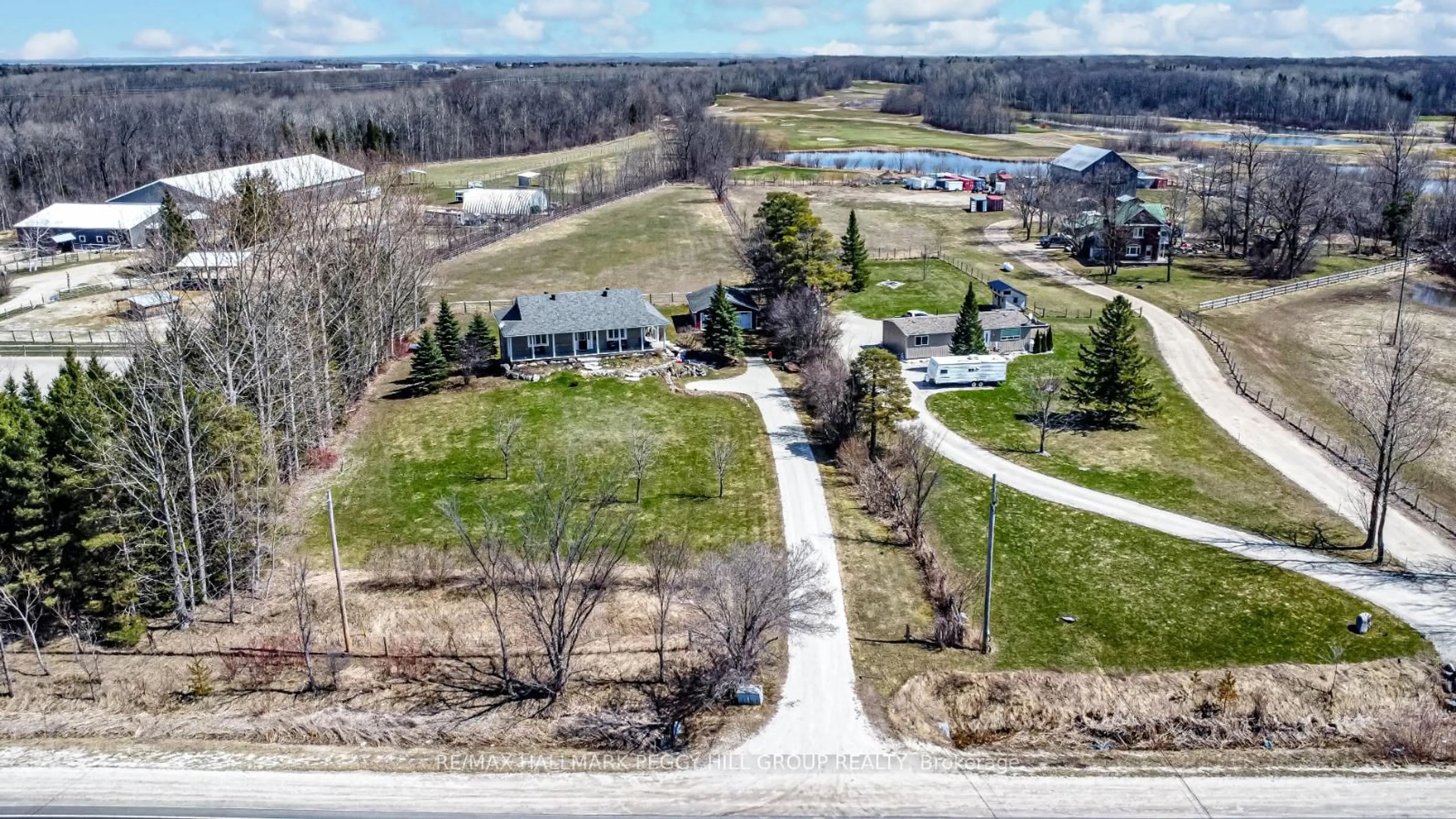 A pic from outside/outdoor area/front of a property/back of a property/a pic from drone, street for 3705 County Road 124, Clearview Ontario L0M 1P0