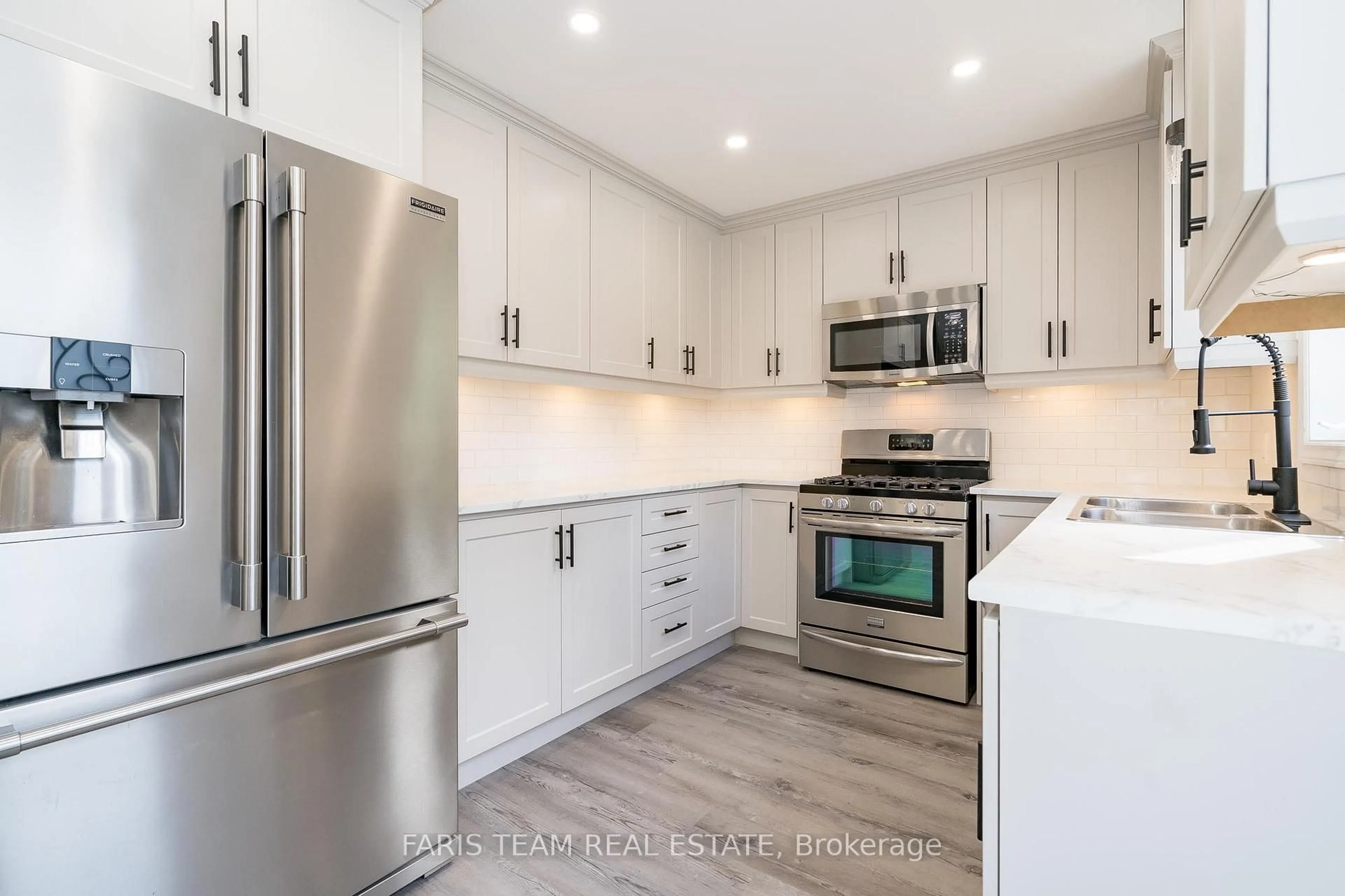 Open concept kitchen, unknown for 76 Marshall St, Barrie Ontario L4N 3S8