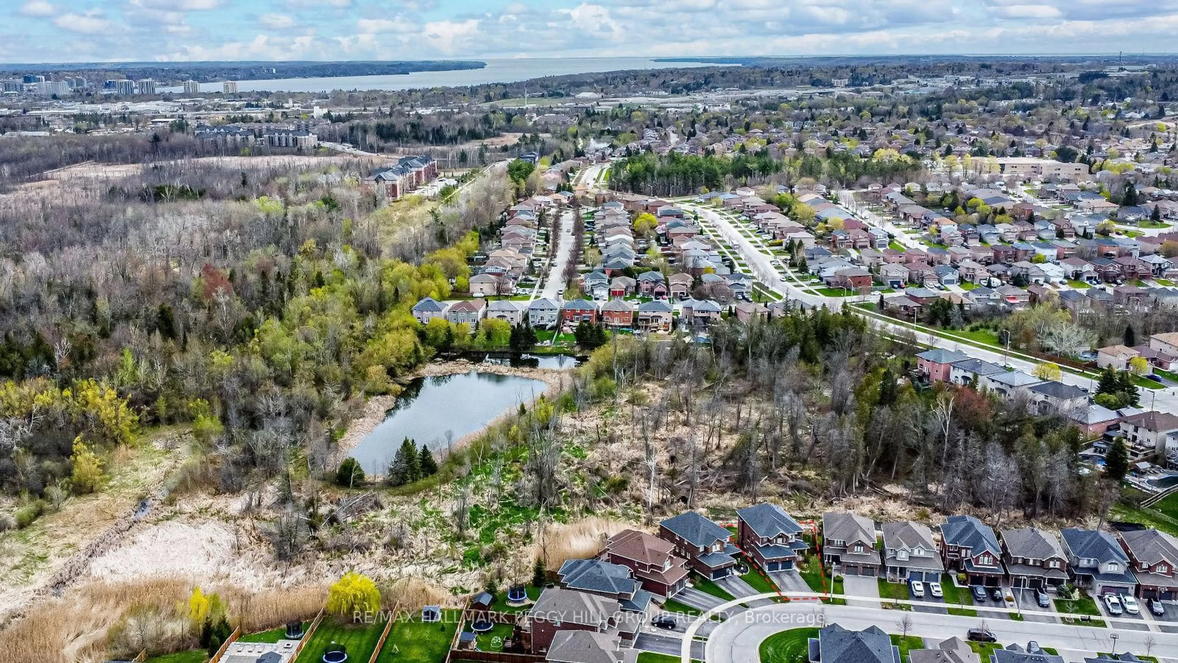 A pic from outside/outdoor area/front of a property/back of a property/a pic from drone, water/lake/river/ocean view for 35 Marta Cres, Barrie Ontario L4N 3N6