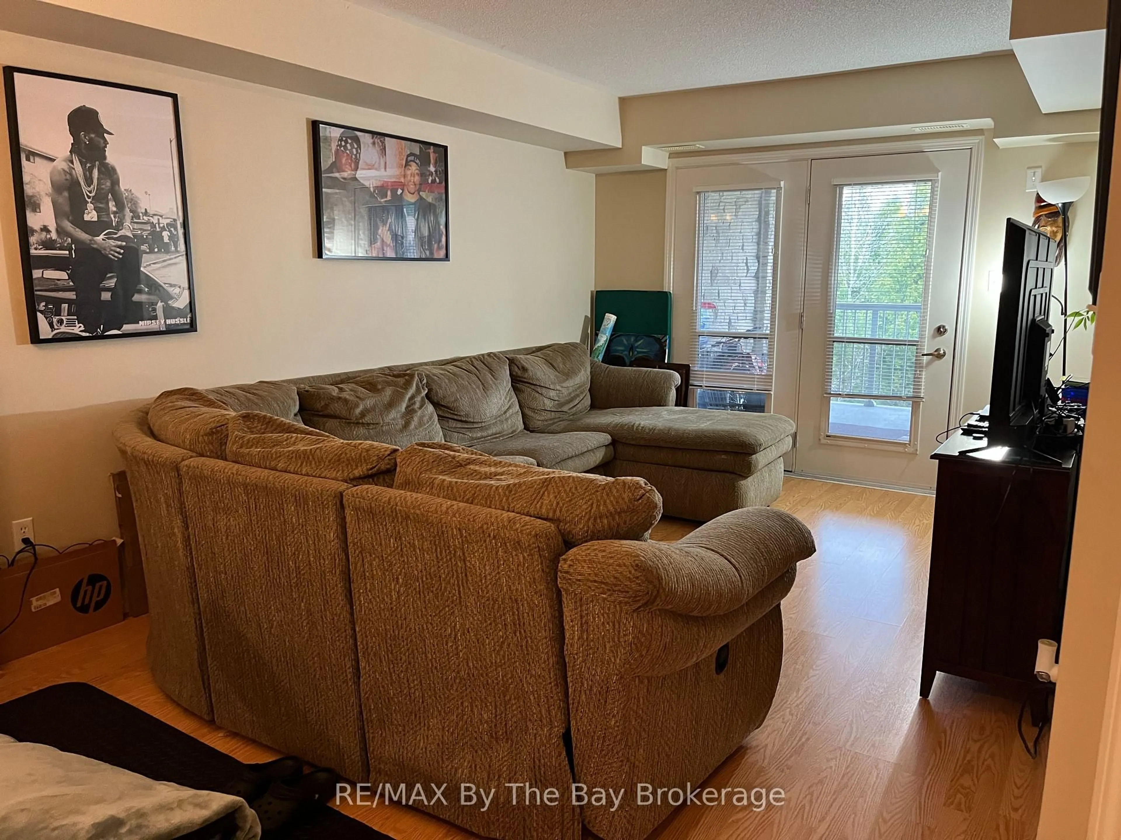 Living room with furniture, unknown for 50 Mulligan Lane #312, Wasaga Beach Ontario L9Z 0C5